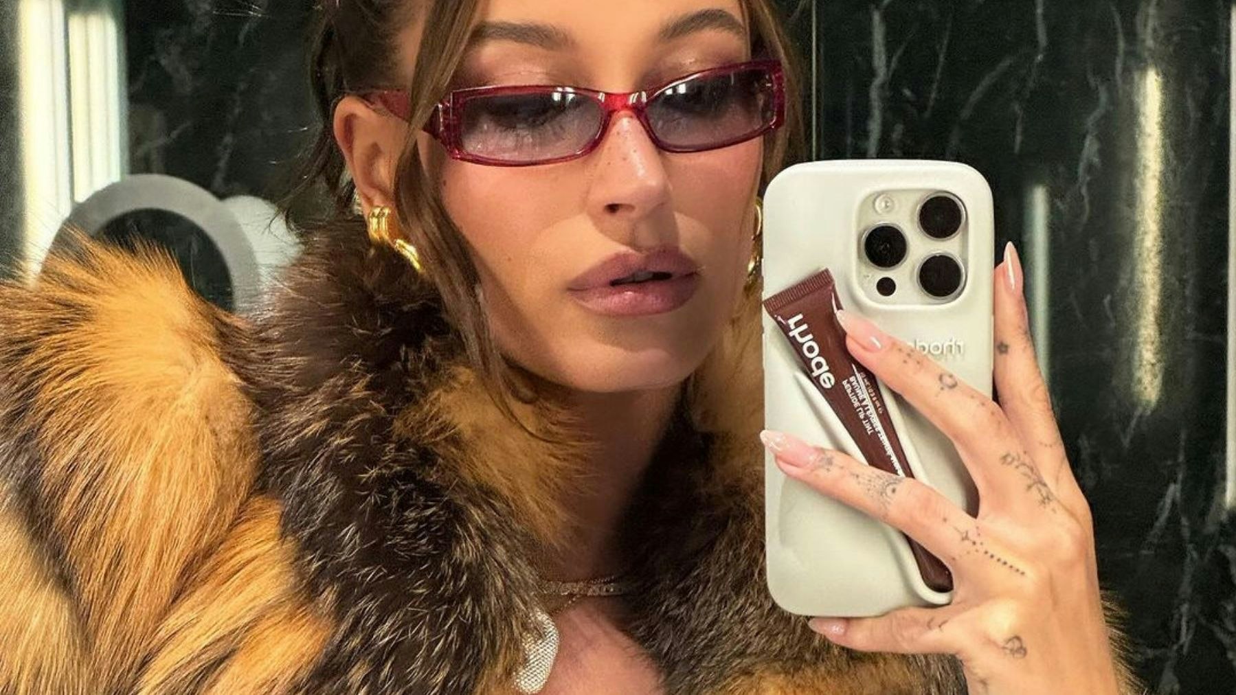 Hailey Bieber's Rhode Lip Phone Case Is Back In Stock Hailey Bieber's Rhode Lip Phone Case Is Back In Stock