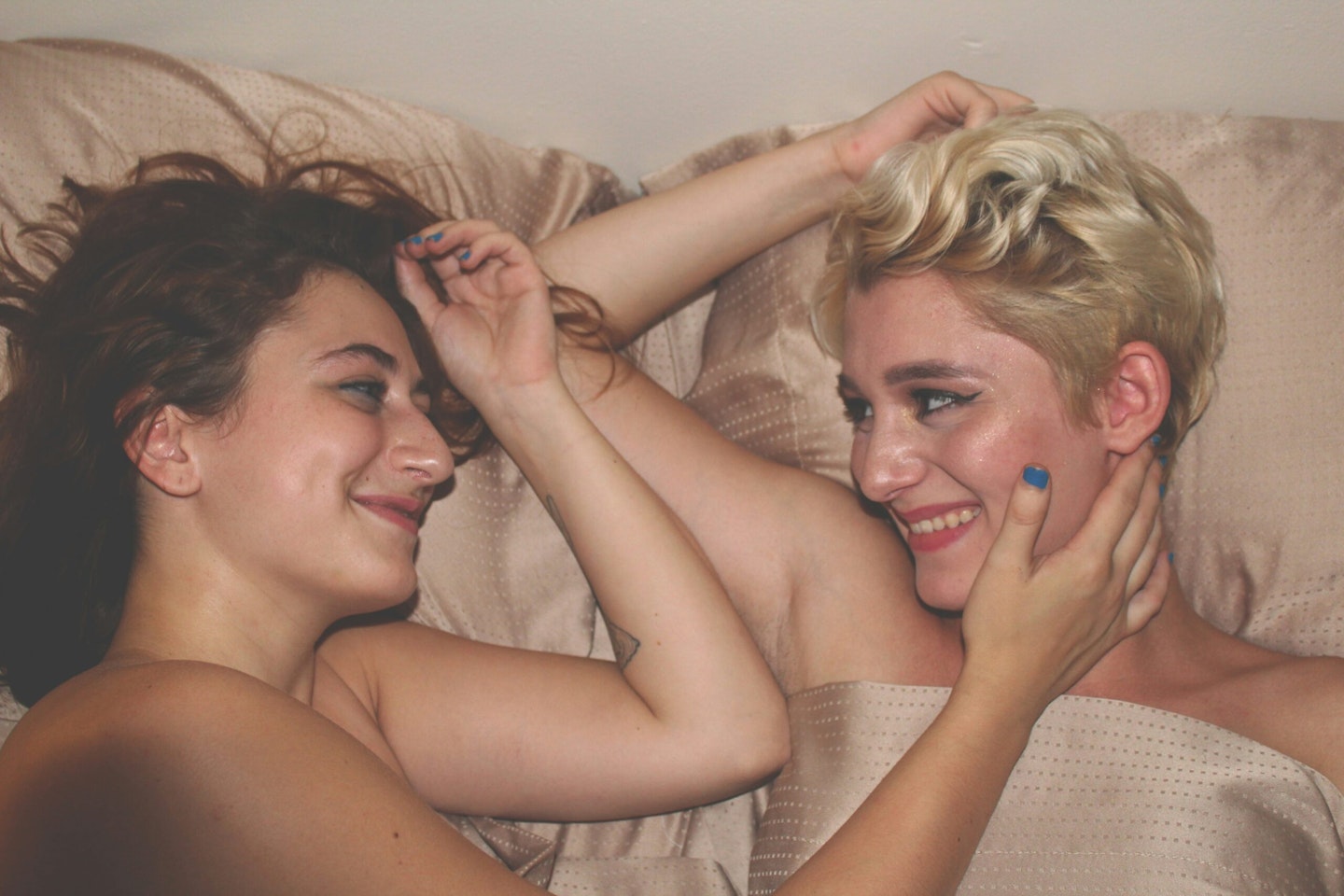 Women in bed together