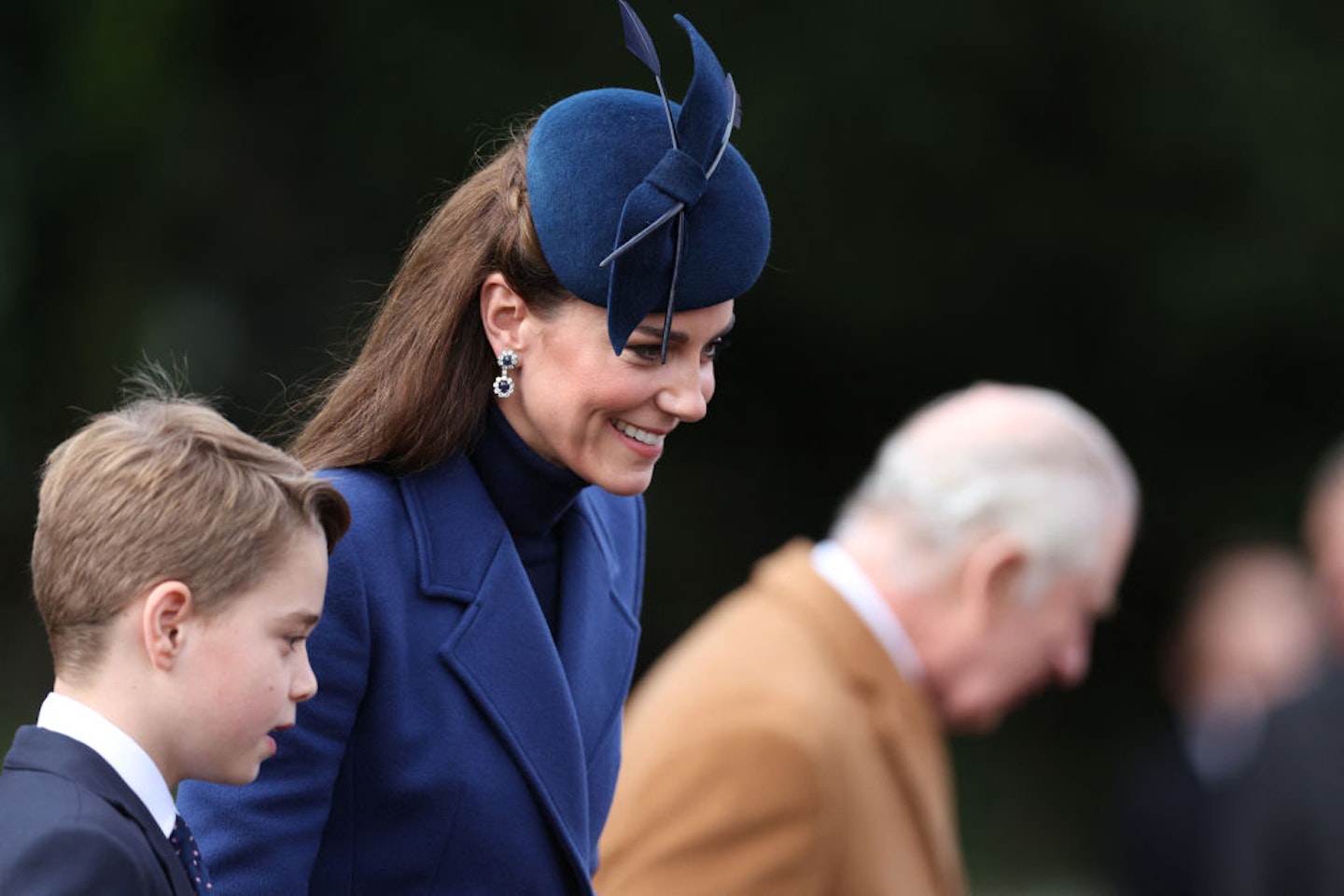 Britain's Catherine, Princess of Wales and Britain's Prince George of Wales (L) leave after attending the Royal Family's traditional Christmas Day service at St Mary Magdalene Church on the Sandringham Estate in eastern England, on December 25, 2023. (Photo by Adrian DENNIS / AFP) (Photo by ADRIAN DENNIS/AFP via Getty Images)