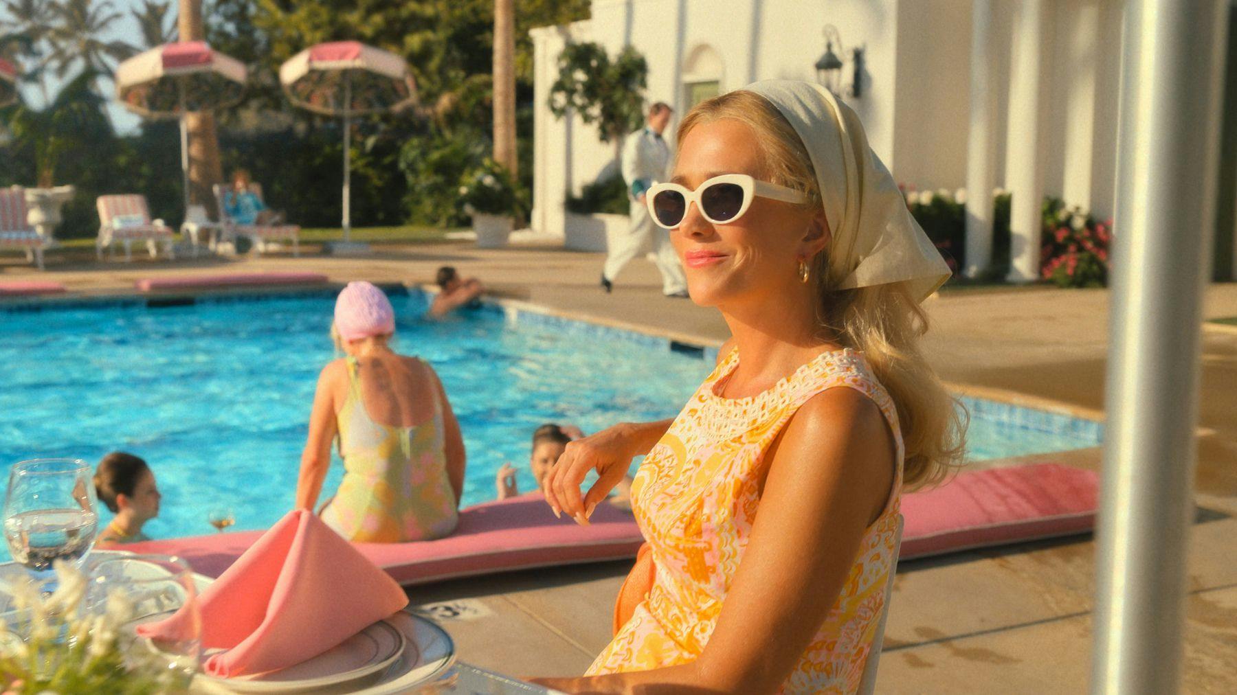 palm royale orange dress How Alix Friedberg Crafted Kristen Wiig's Wardrobe for 'Palm Royale'