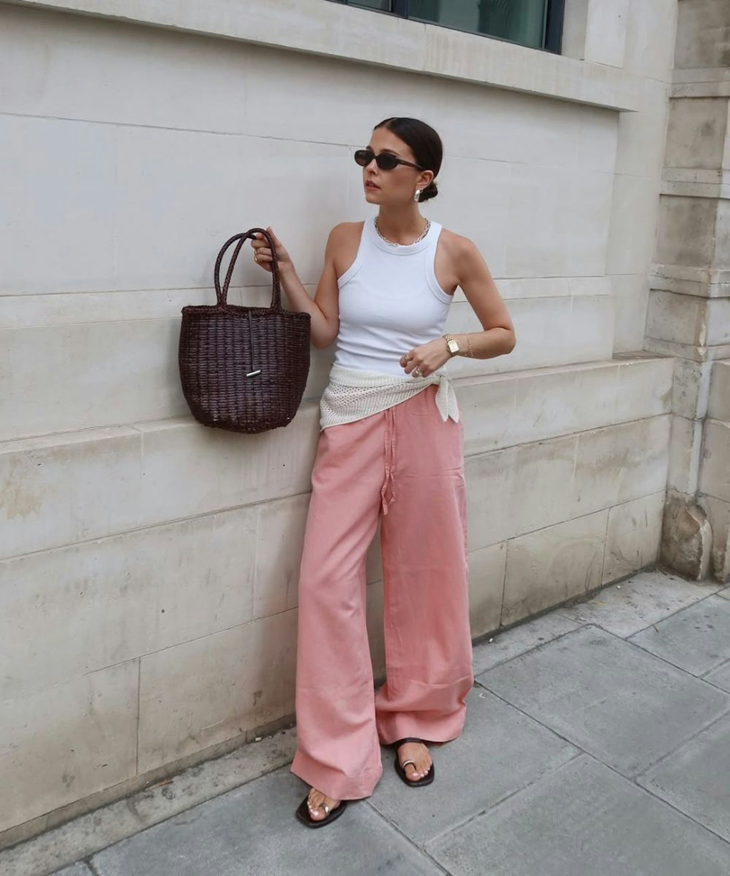 influencer wearing linen trousers from cos