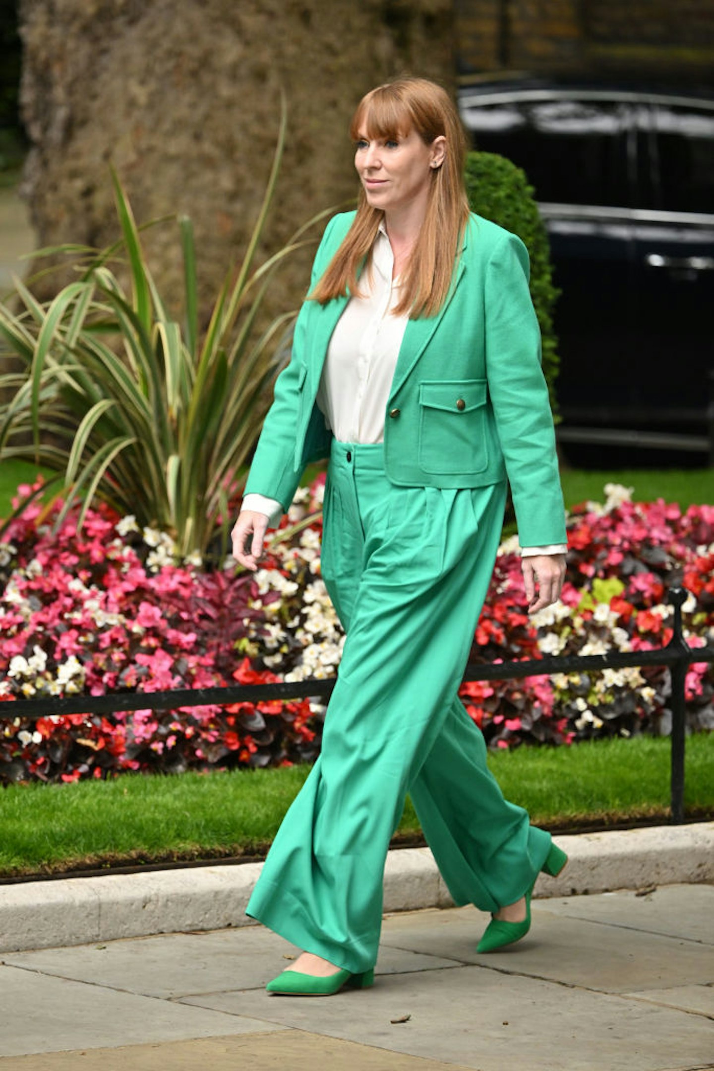 Angela Rayner in a green ME+EM suit