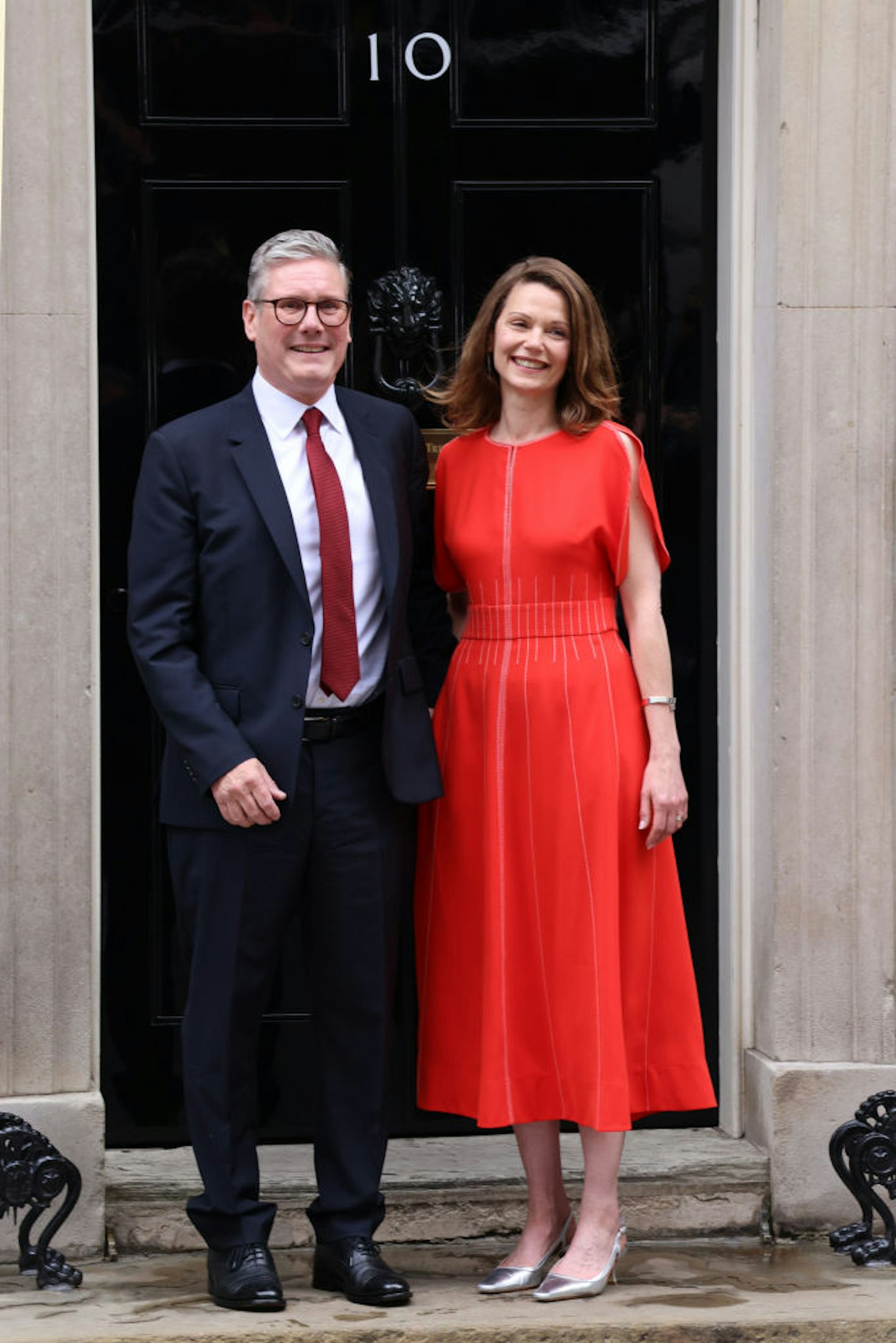 Sir Keir Starmer and wife Victoria in a red ME+EM dress