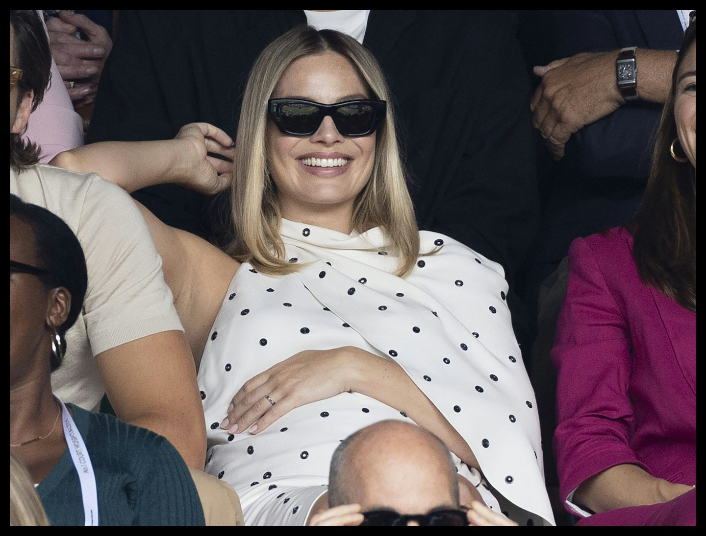 Margot Robbie and her baby bump at Wimbledon 2024.