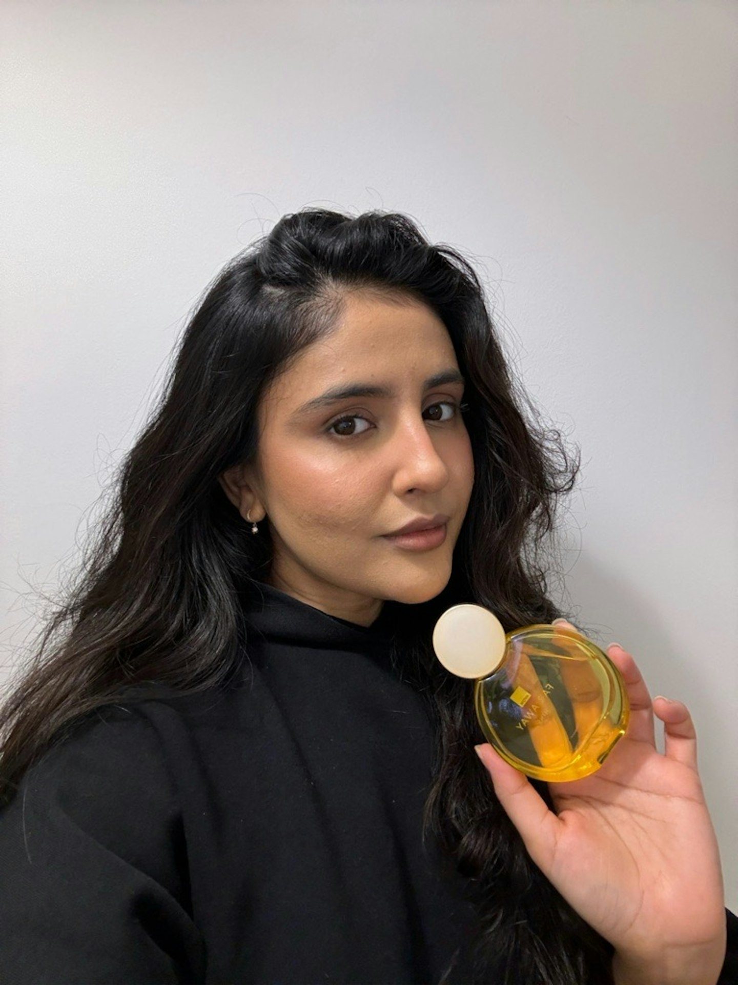 Beauty writer Sameeha Shaikh testing Avon's Far Away Shine perfume