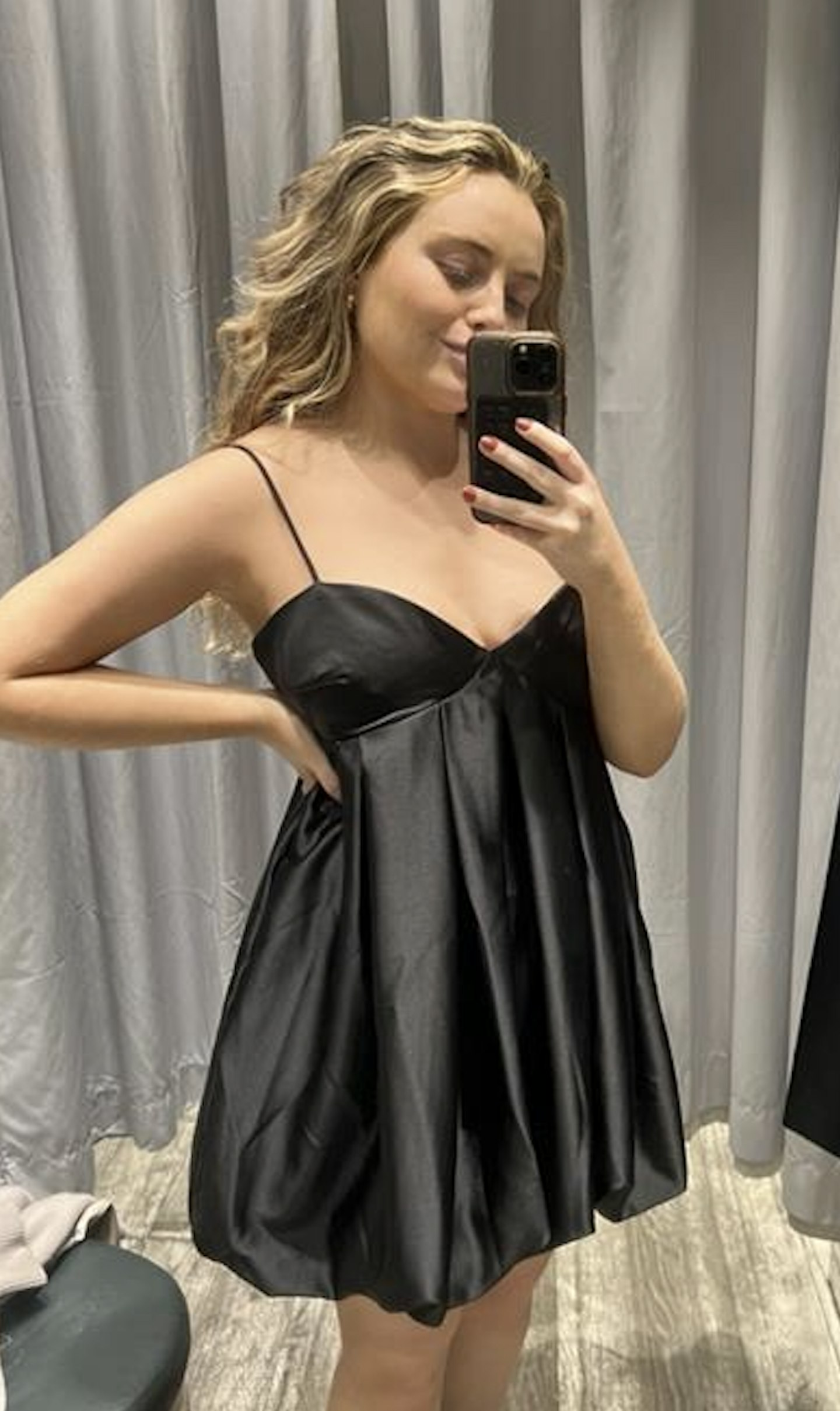 Lauren wears H&M black bubble hem dress