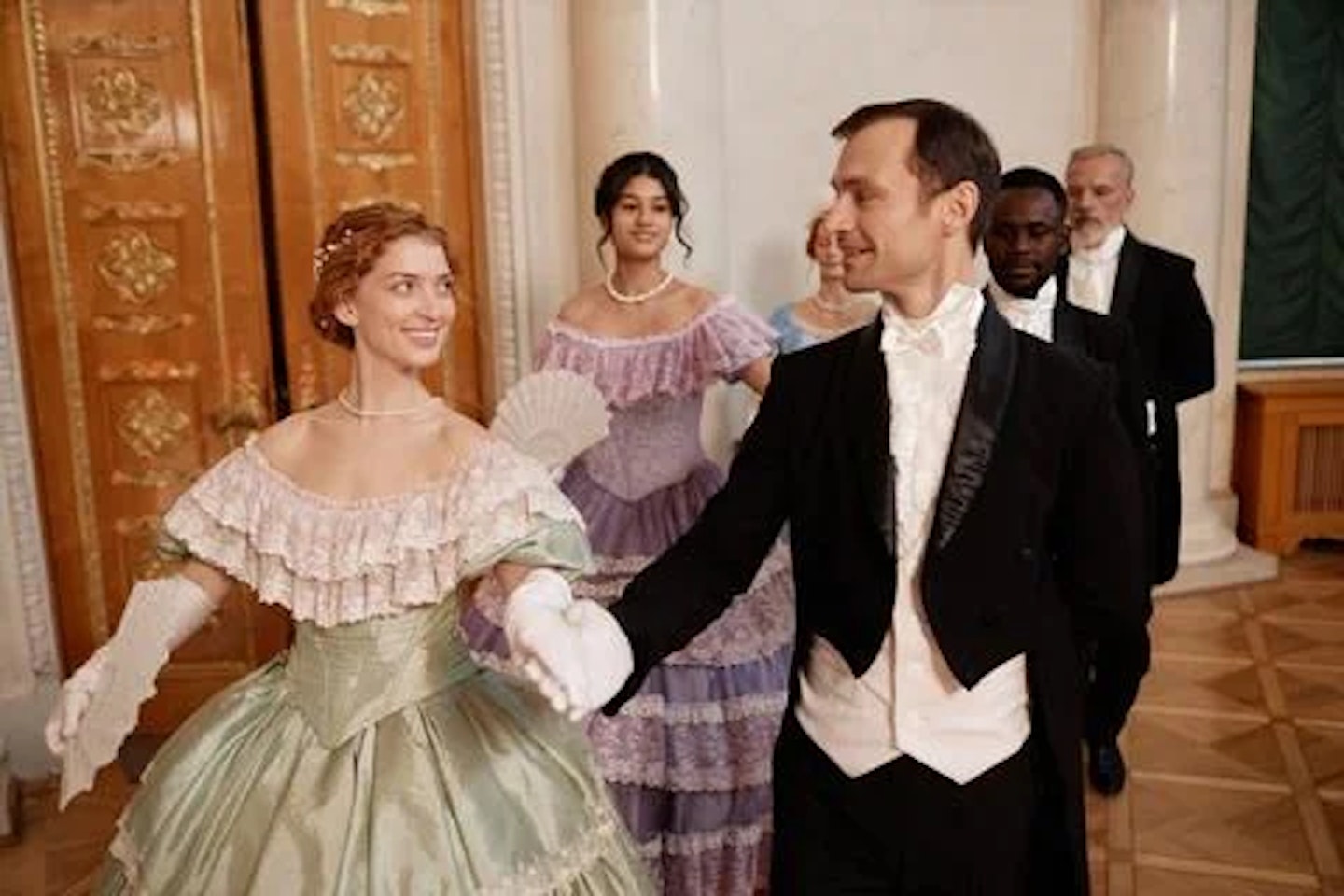 A couple dancing at a debutante ball