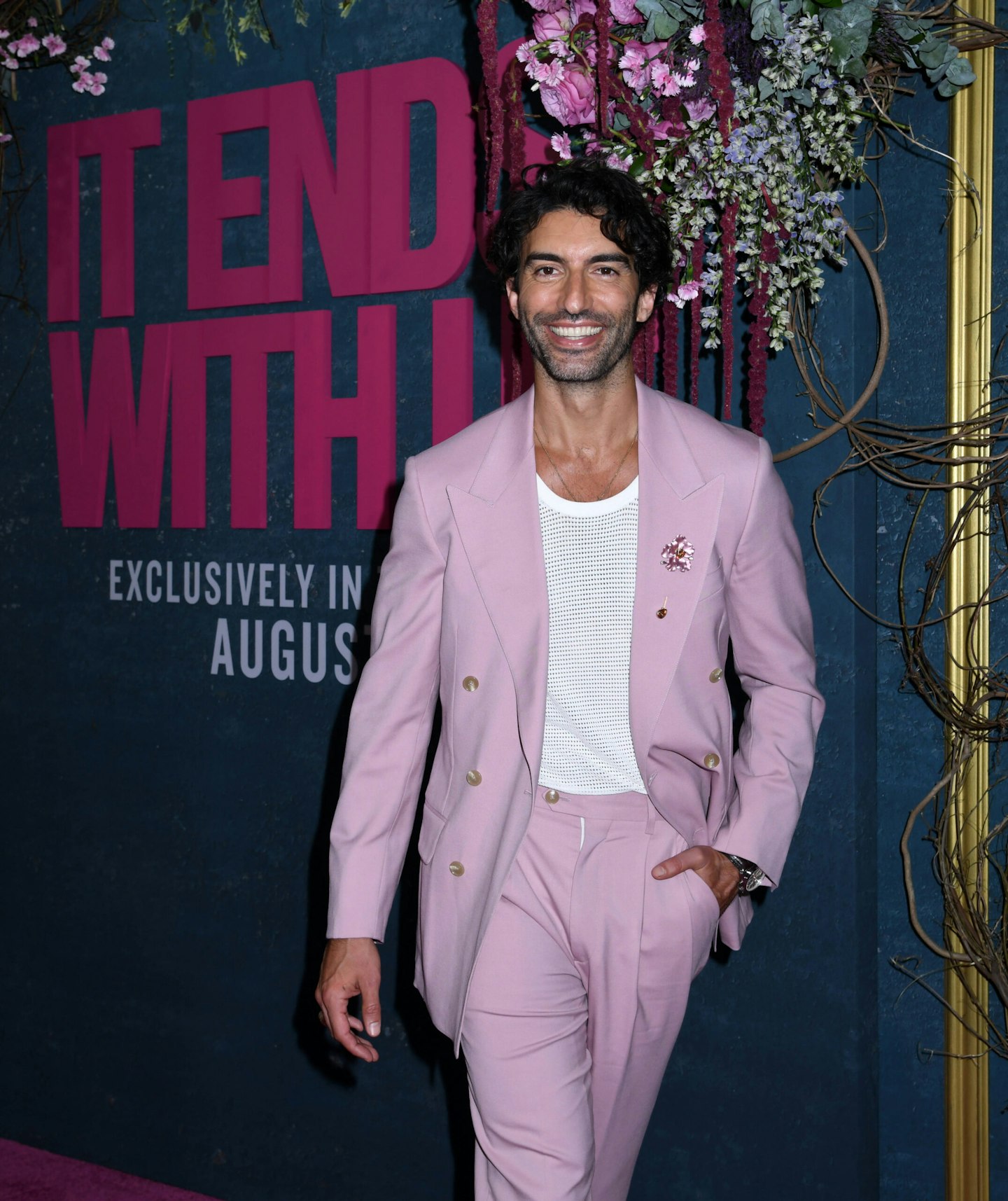 Justin Baldoni smiles at the It Ends With Us premiere