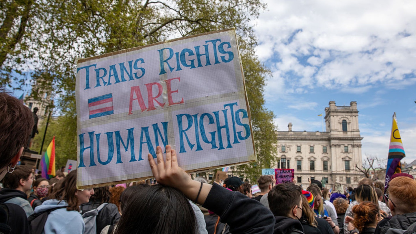 LONDON, WESTMINSTER, UNITED KINGDOM - 2025/04/19: A Trans rights activist holds a placard during the demonstration. Members of the Trans community and their supporters held an emergency demonstration in Central London calling for "Trans Liberation". After a UK Supreme Court ruling that the definition of a woman should be based on biological sex, a demonstration was organised to show support for Trans Men and Women. At 12:00 on Saturday 19th April 2025, crowds gathered in Parliament Square Westminster for a rally and march. At approximately 13:30 the demonstrators left Parliament Square and headed through Westminster stopping at several contentious locations including the Supreme Court.