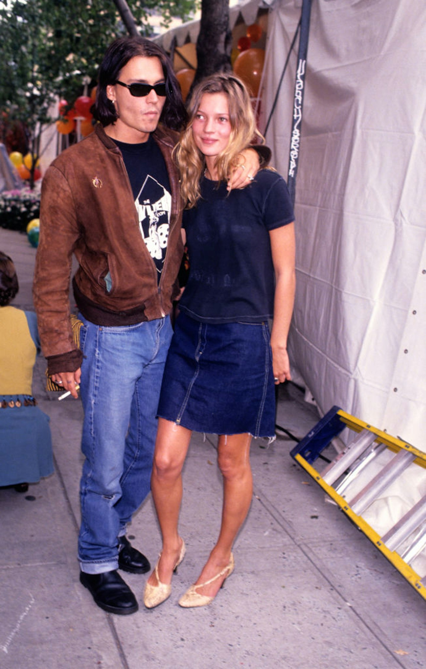 Kate Moss in a denim skirt in 1990