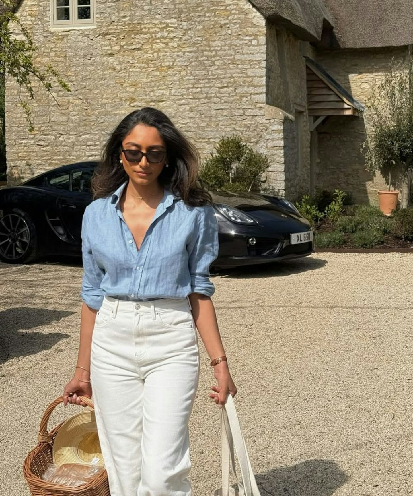 influencer wearing a with nothing underneath linen boyfriend shirt