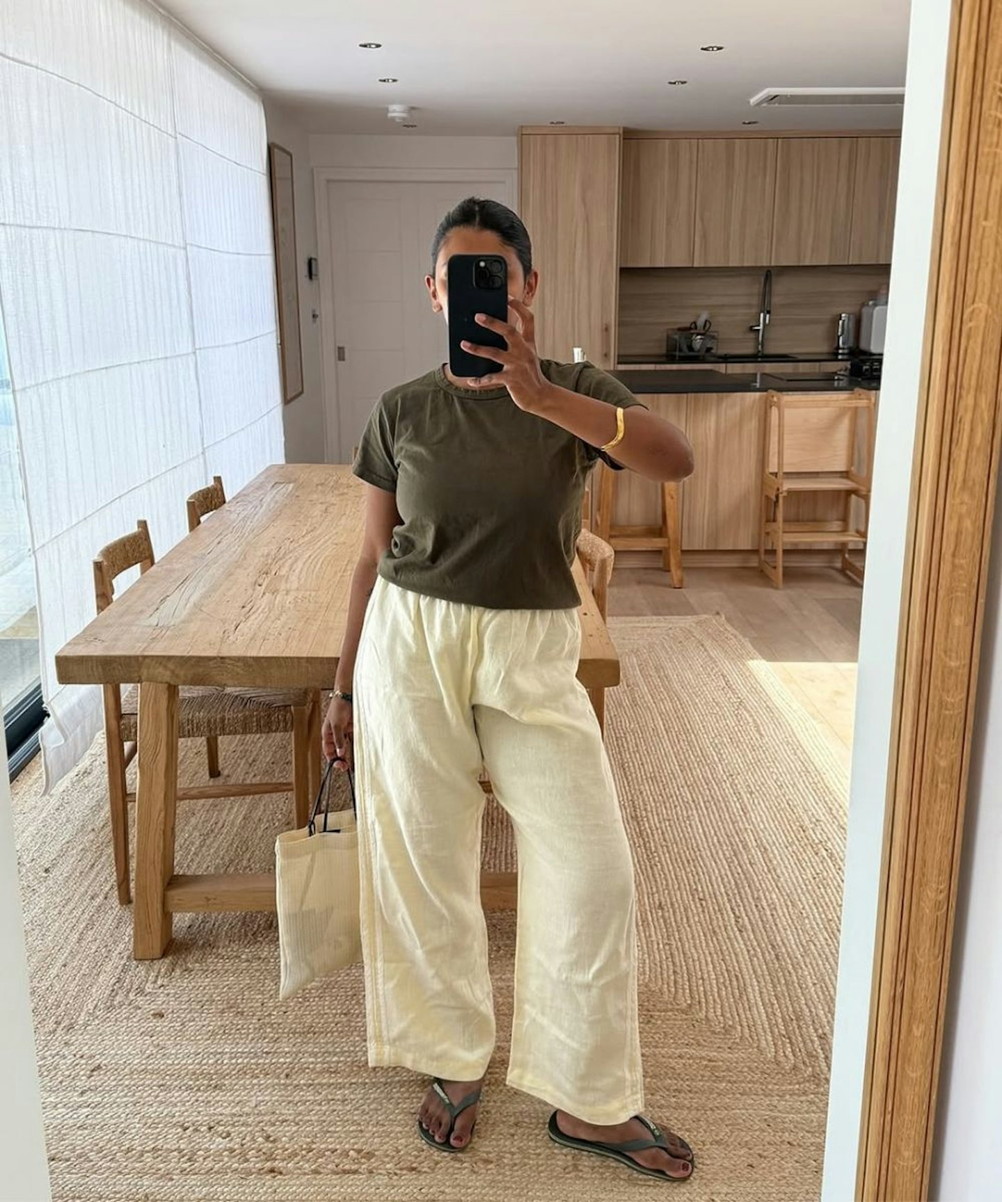 influencer wearing linen trousers