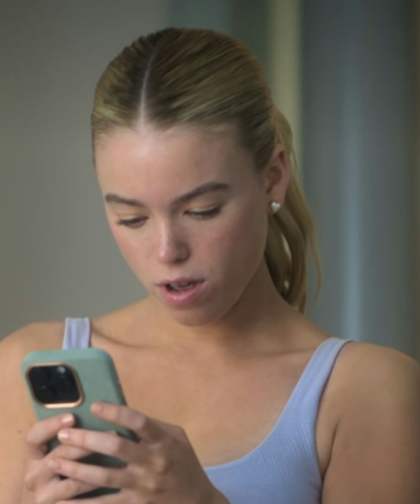 Netflix's sirens outfits Simone wearing heart earrings