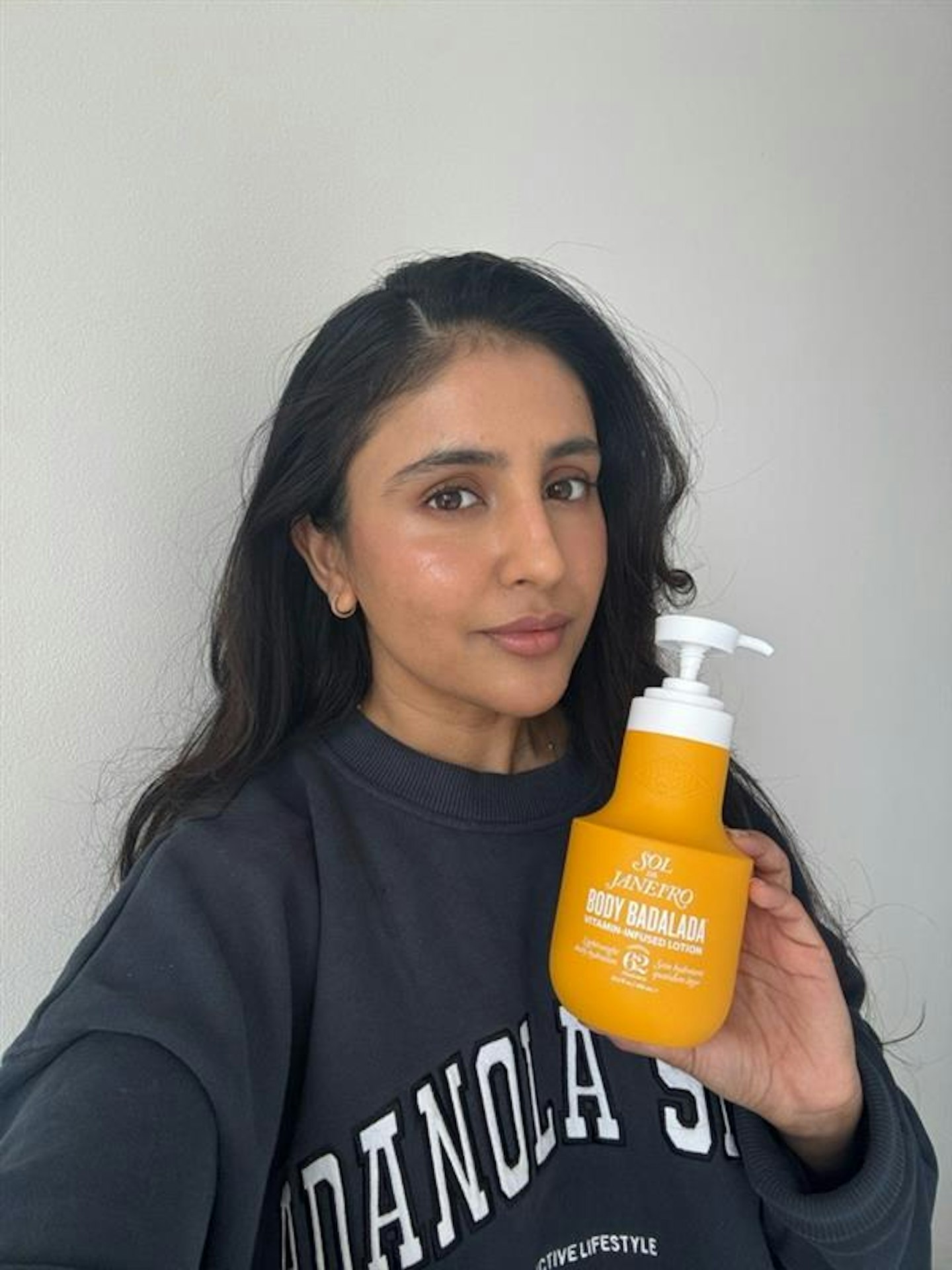 Sameeha Shaikh, beauty writer, testing Sol De Janeiro's new Body Badalada™ Lotion