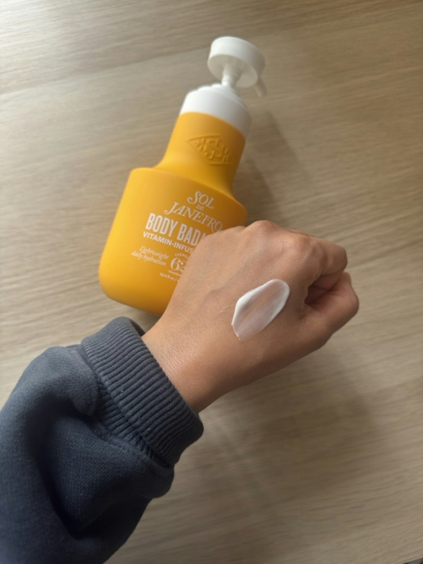 Sameeha Shaikh, beauty writer, testing Sol De Janeiro's new Body Badalada™ Lotion