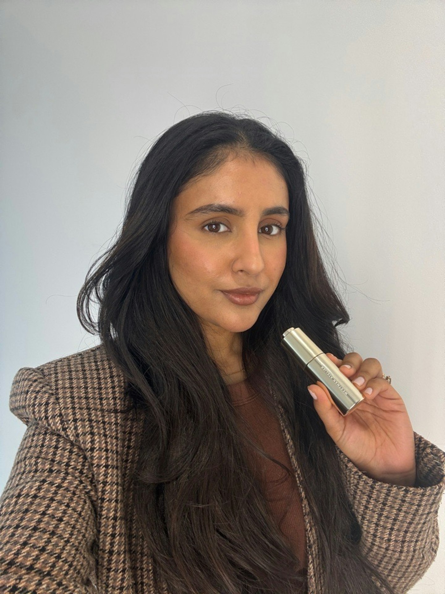 Ssameeha Shaikh, beauty writer, using the Westman Atelier Eye Activator Serum