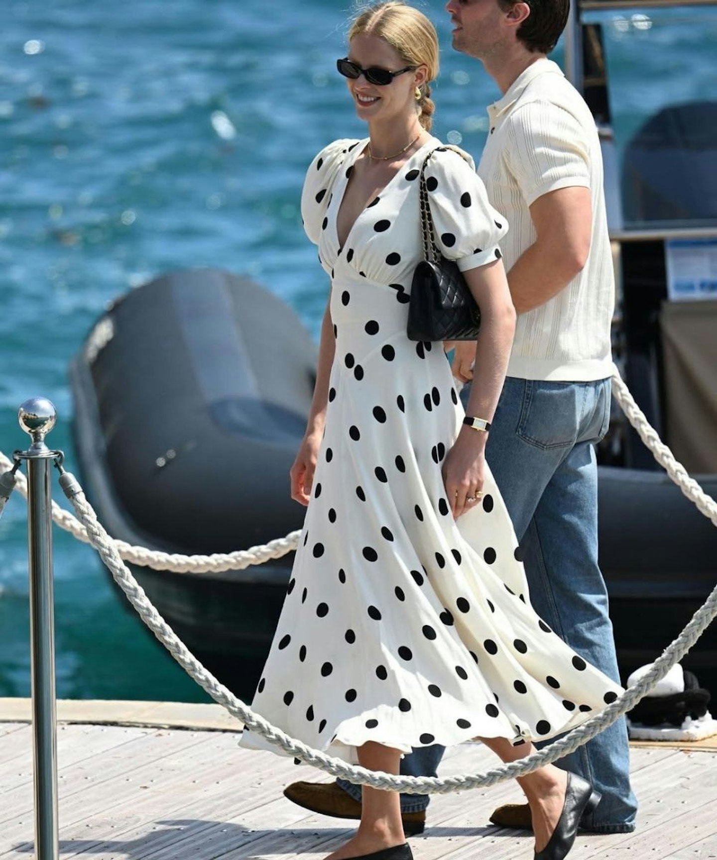 Abby Champion wearing Reformation's Naira Dress