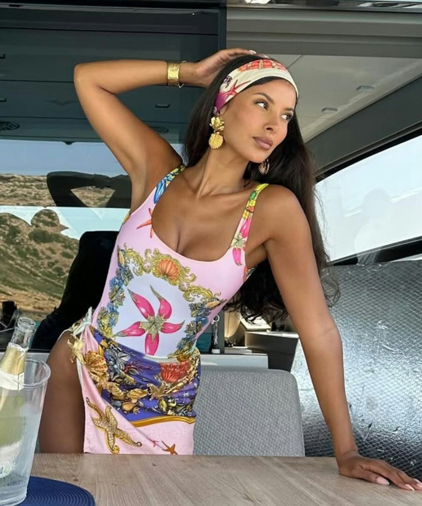 maya jama wearing chloé seashell earrings