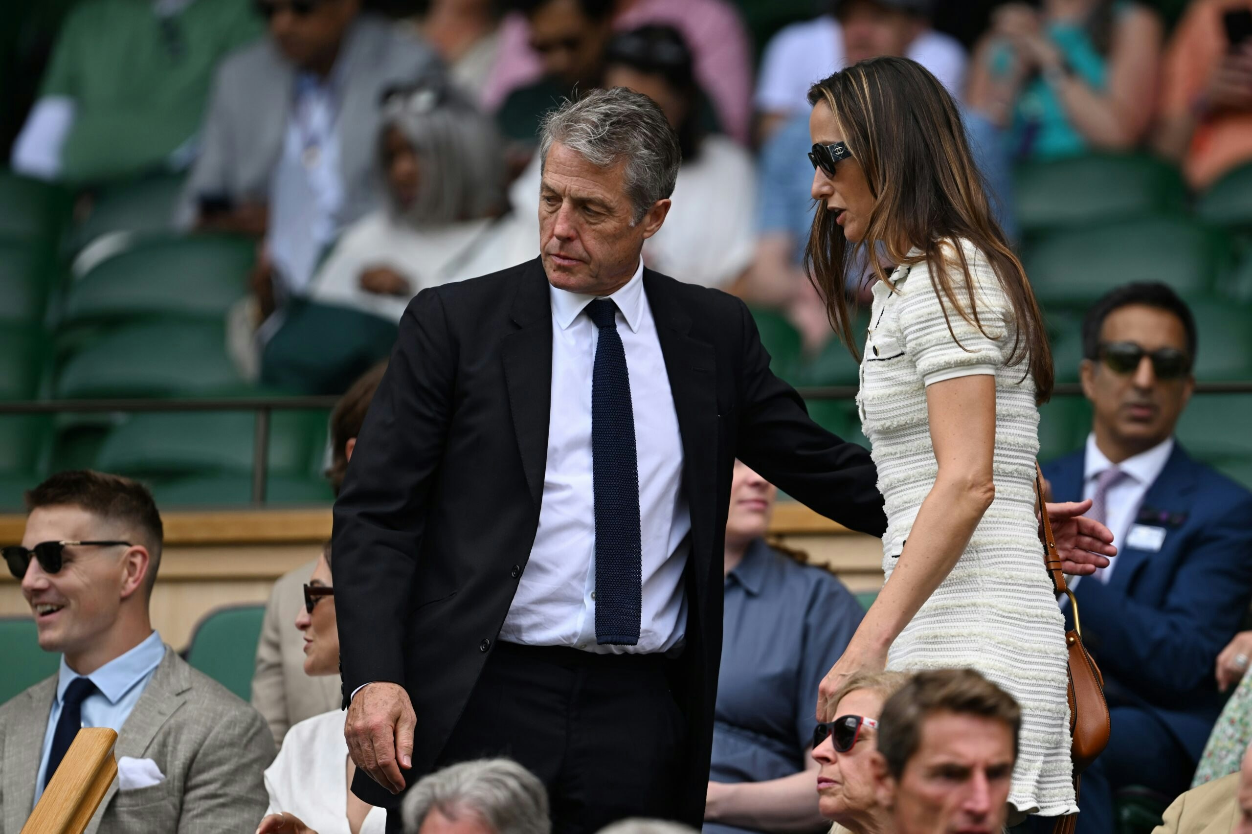 Actor Hugh Grant and his wife, Anna Grant