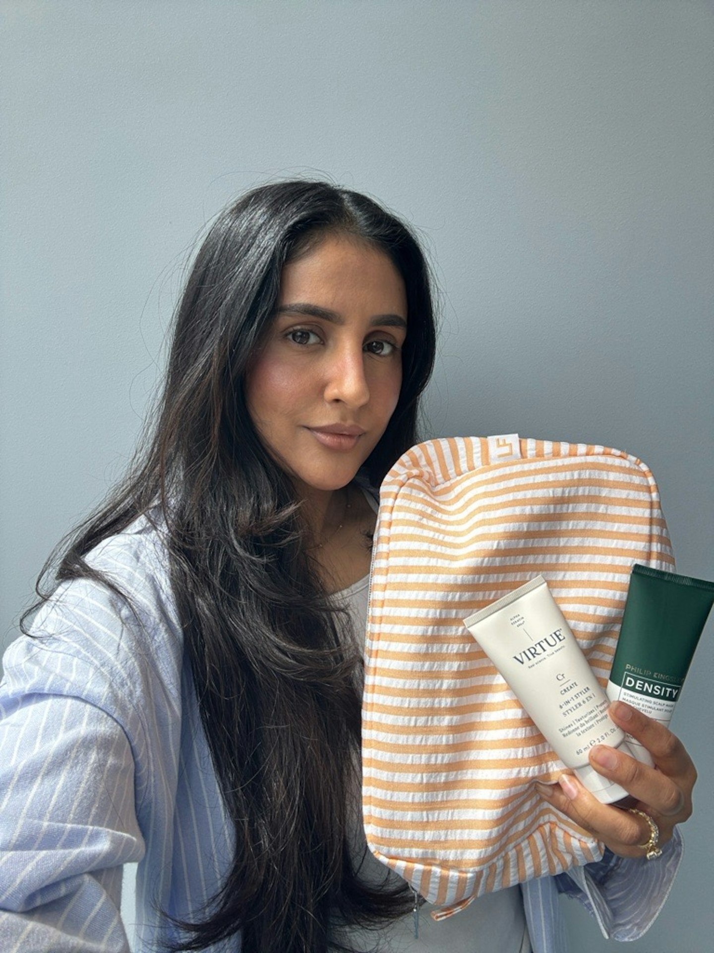 Sameeha Shaikh, beauty writer, using the LookFantastic Hair Volume Edit