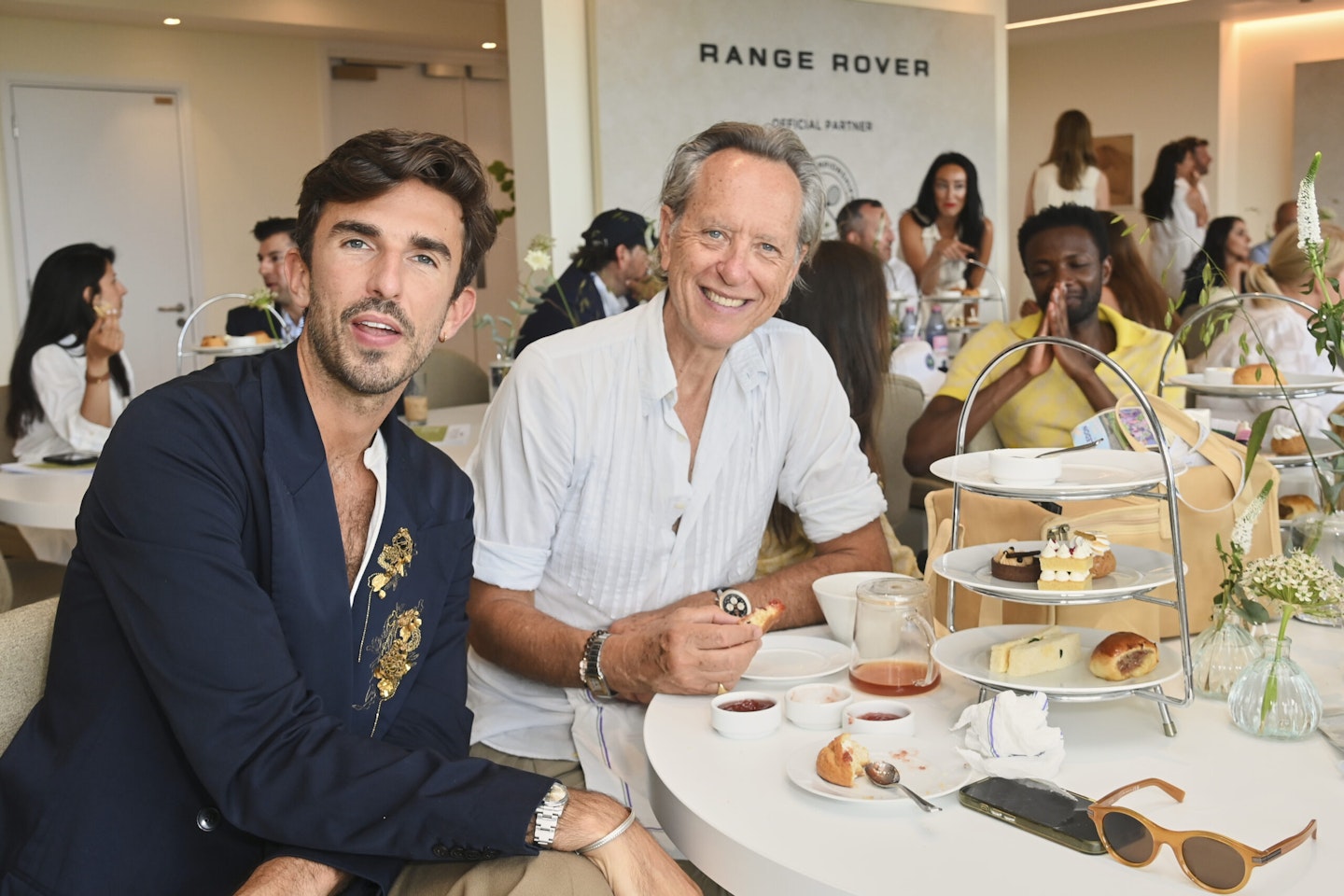 Journalist Teo Van Den Broeke and Actor Richard E. Grant