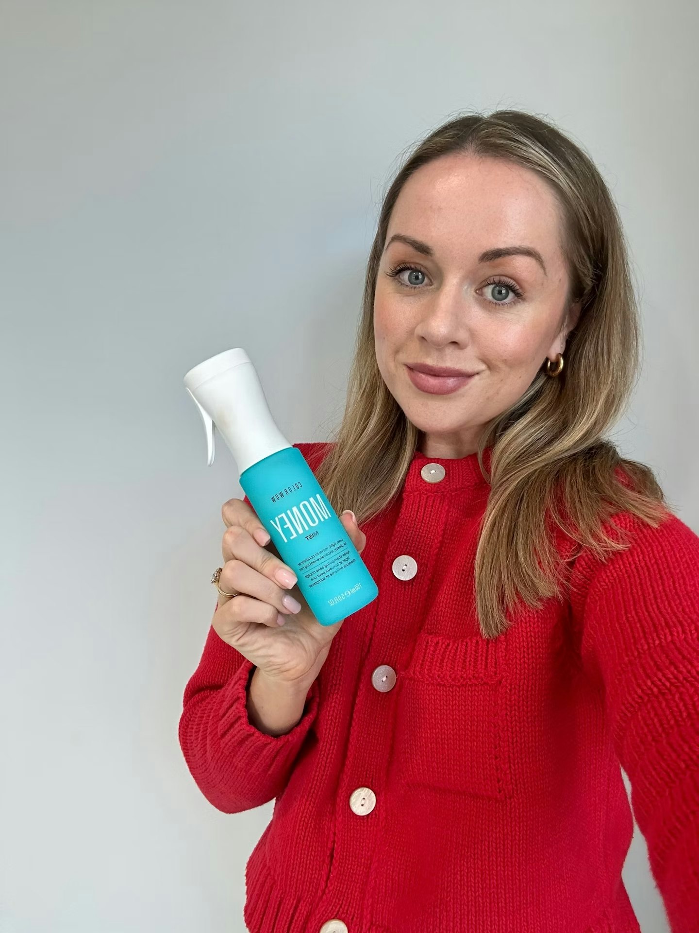 Rachael Martin, beauty director, using the Color Wow Money Mist