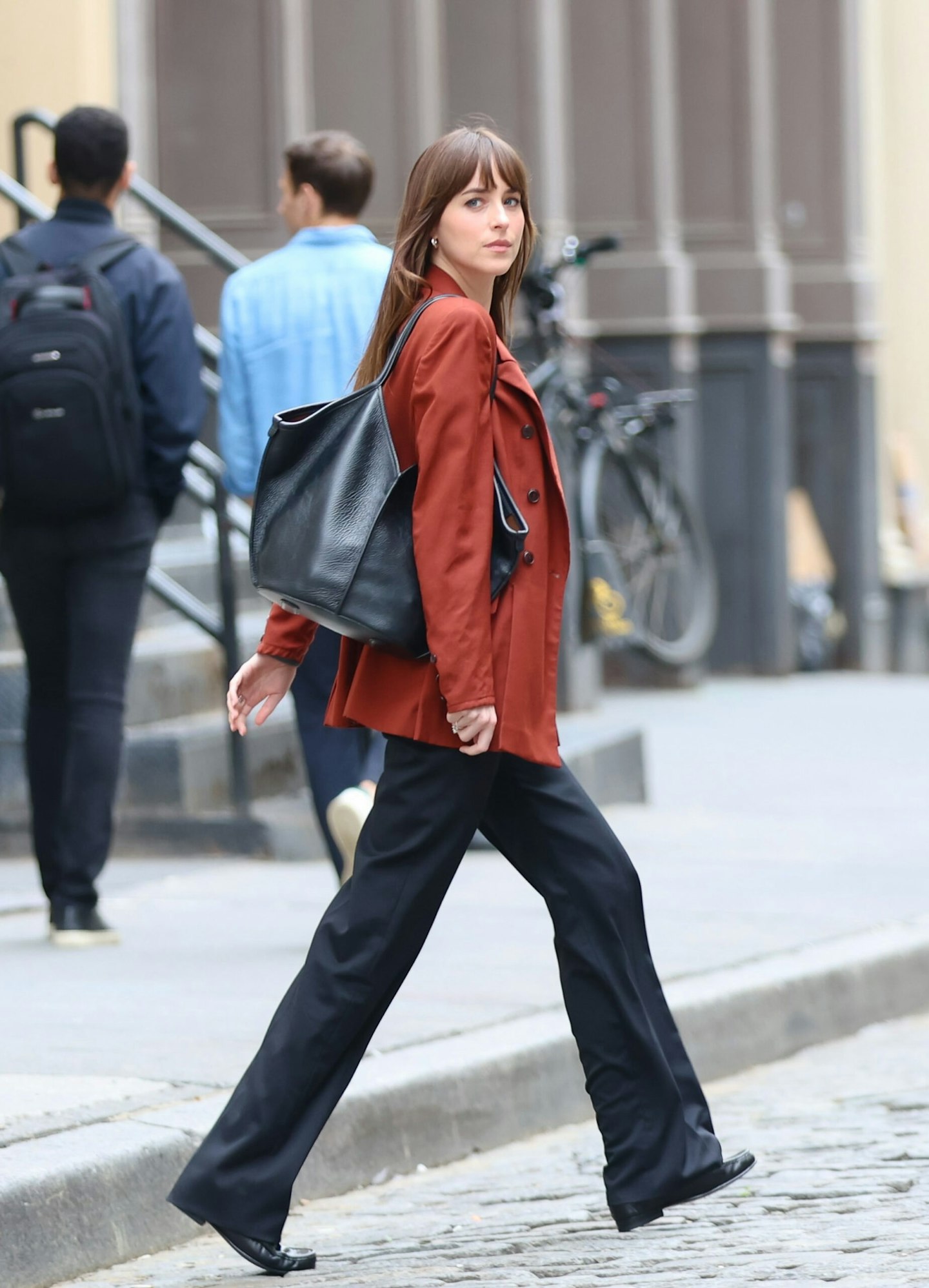 Dakota Johnson wearing tote bag