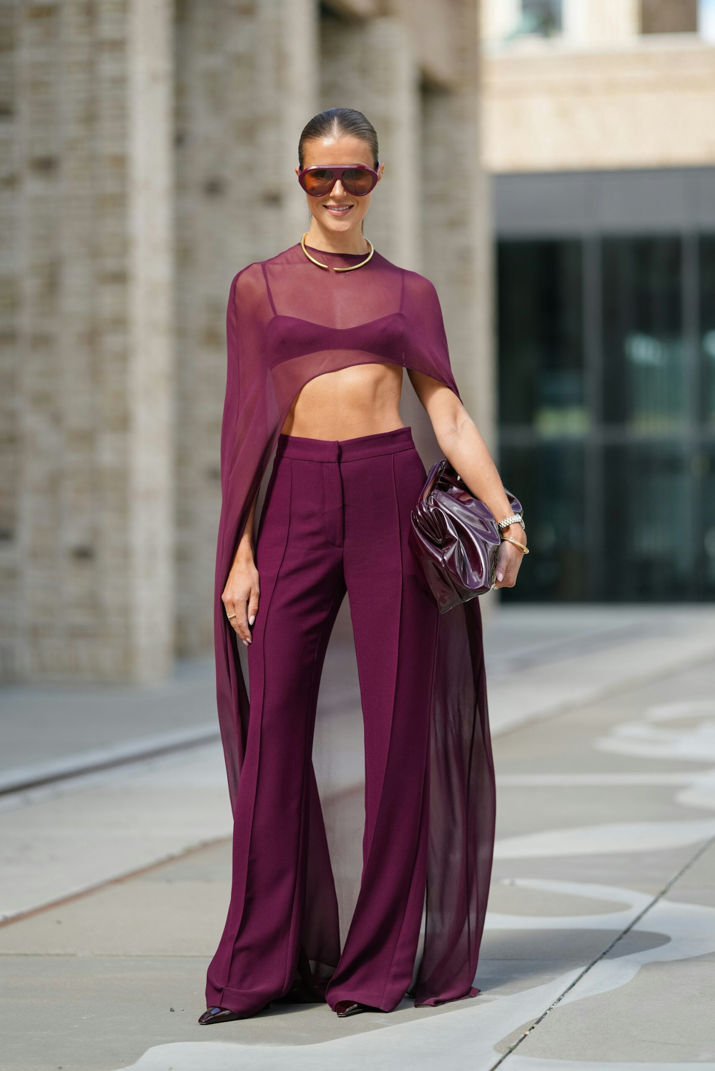 Street style wearing cape top
