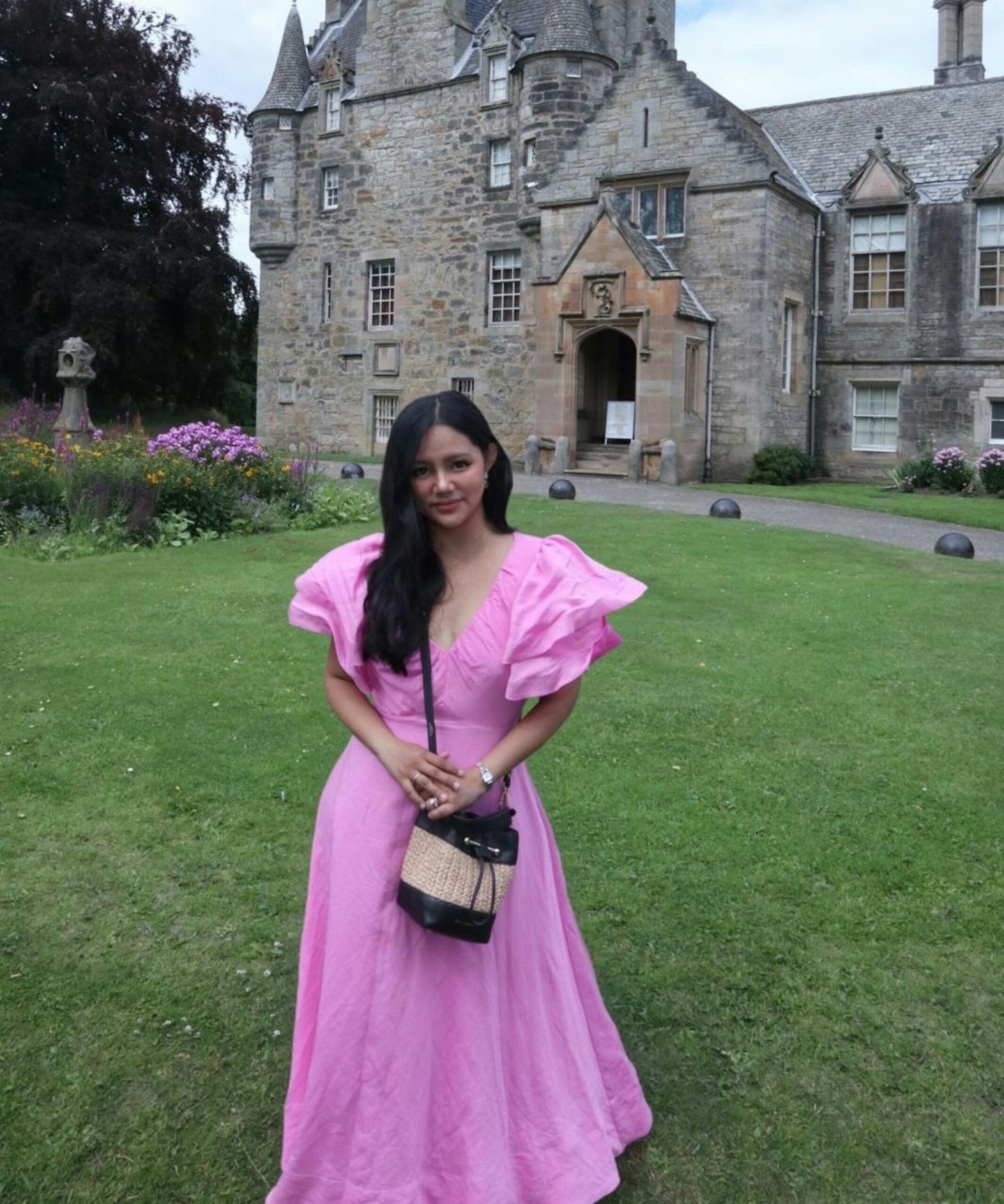 Grazia Fashion writer Anne Lora Scagliusi wearing a pink Monsoon dress at Lauriston Castle.