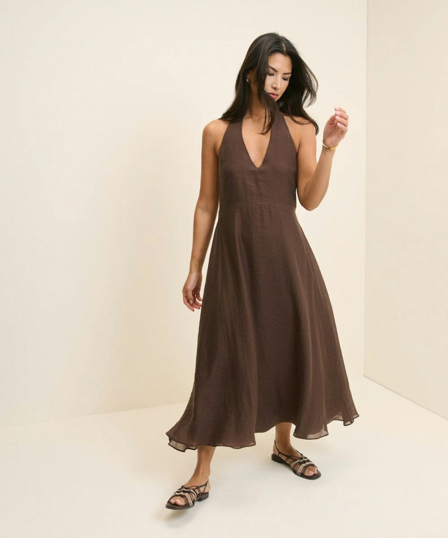 bella hadid brown halter dress Bella Hadid Pairs a Summer 2026 Dress Trend With Celeb-Beloved Sandals