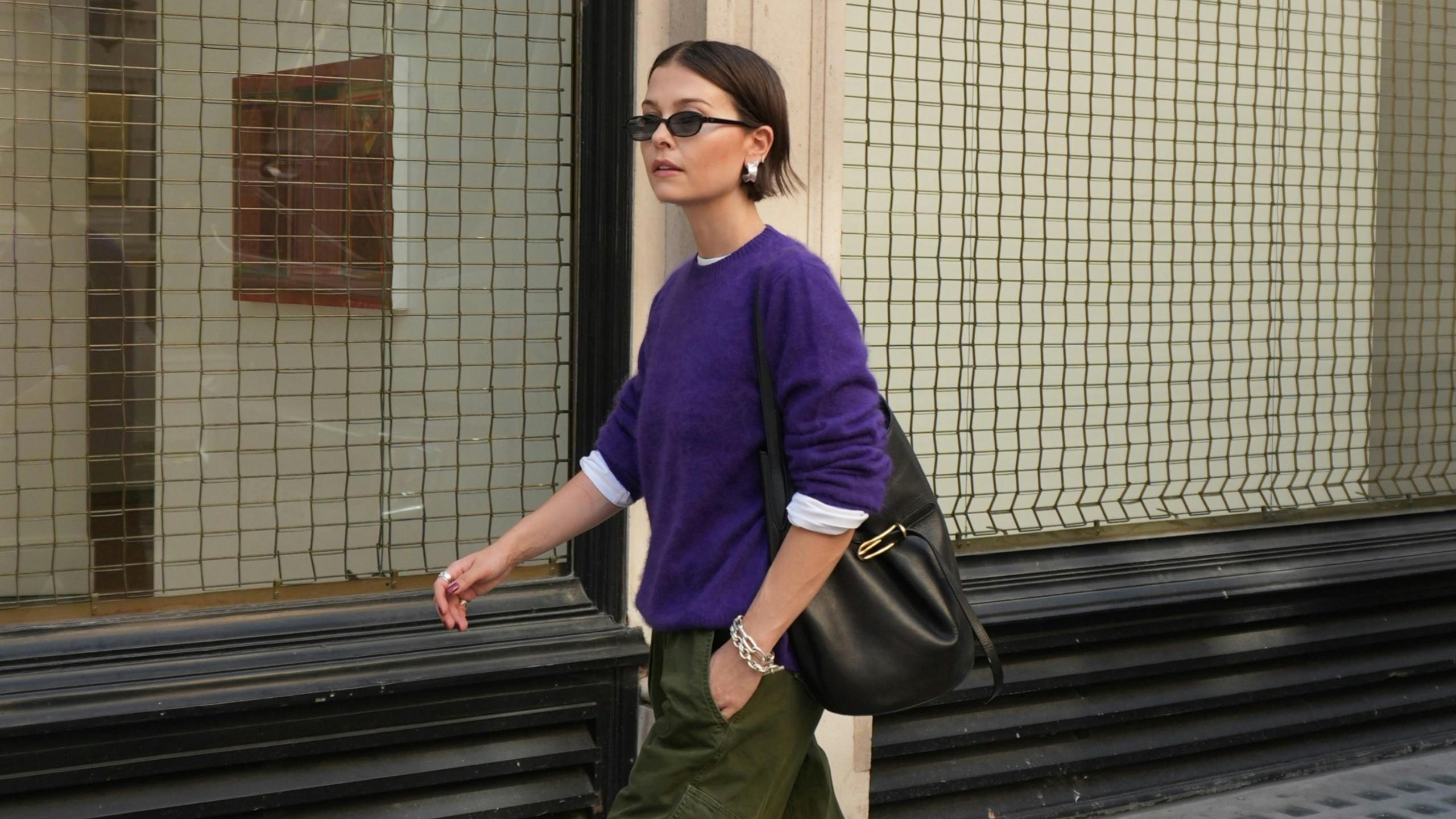 I Keep Seeing Purple Knitwear On Stylish Women – Here's Why