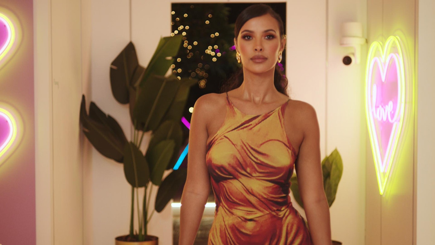 Maya Jama walking into the Love Island villa