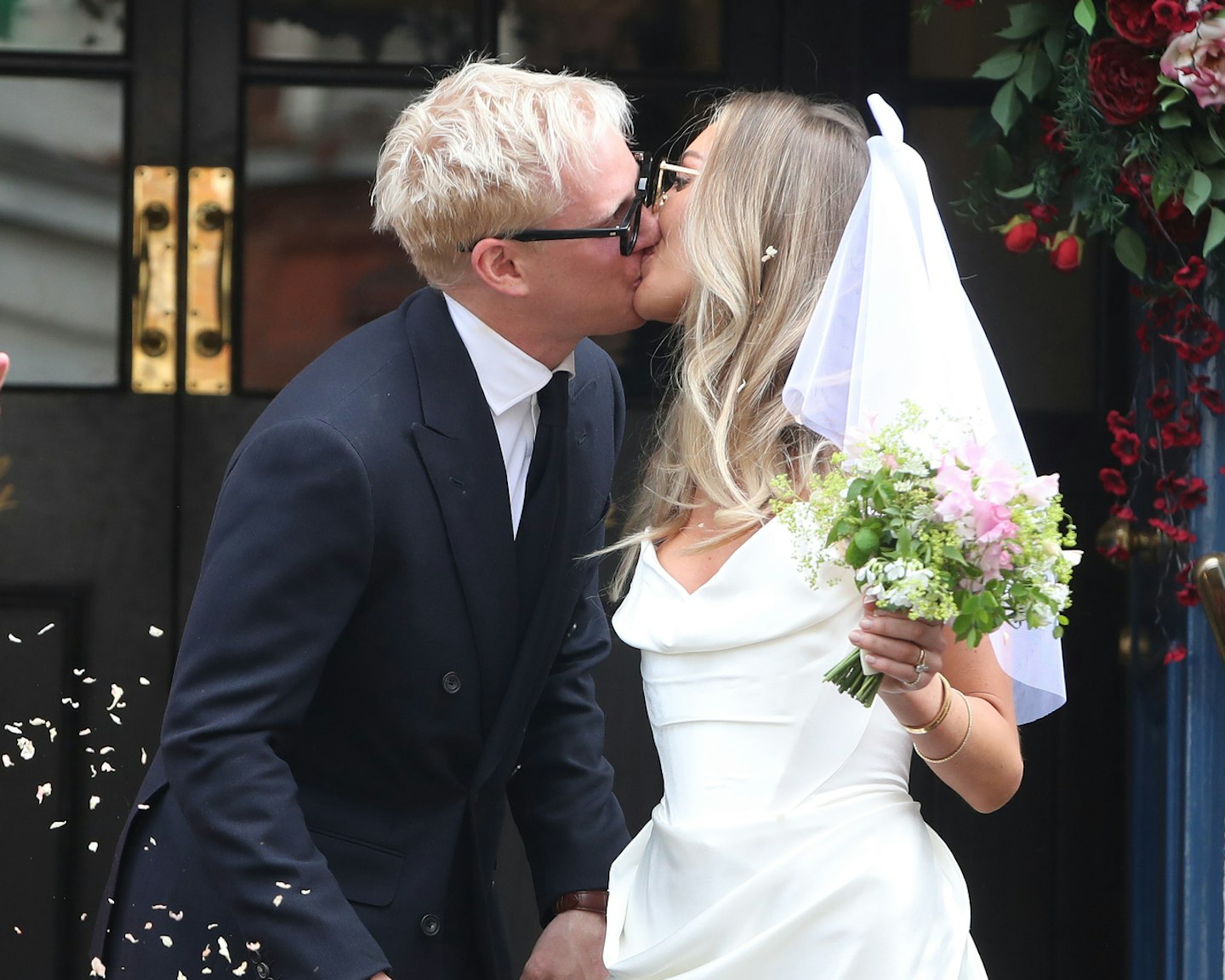 Jamie Laing and Sophie Habboo kissing after getting married