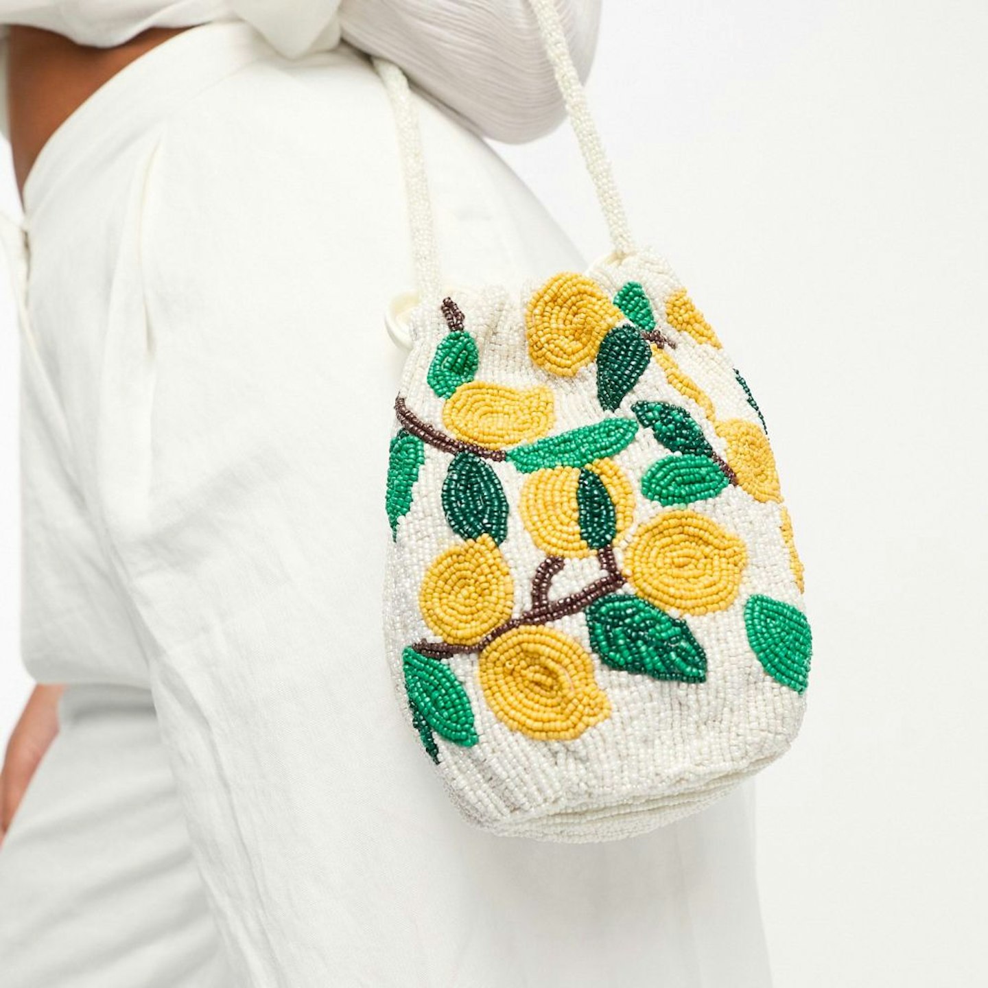 Accessorize mini beaded fruit drawstring bag in yellow and white