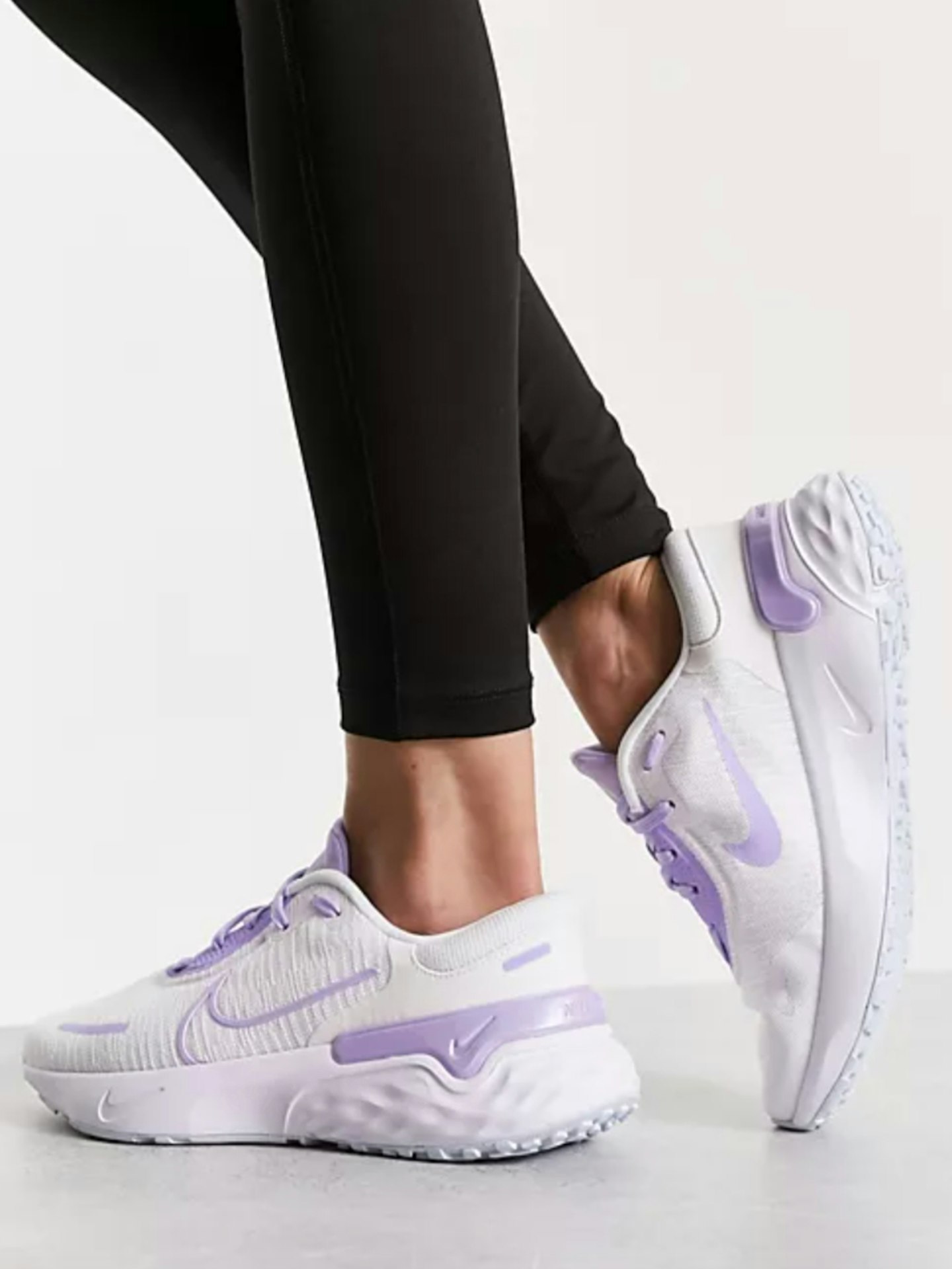 Nike Running Renew Run 4 Trainers in White and Purple