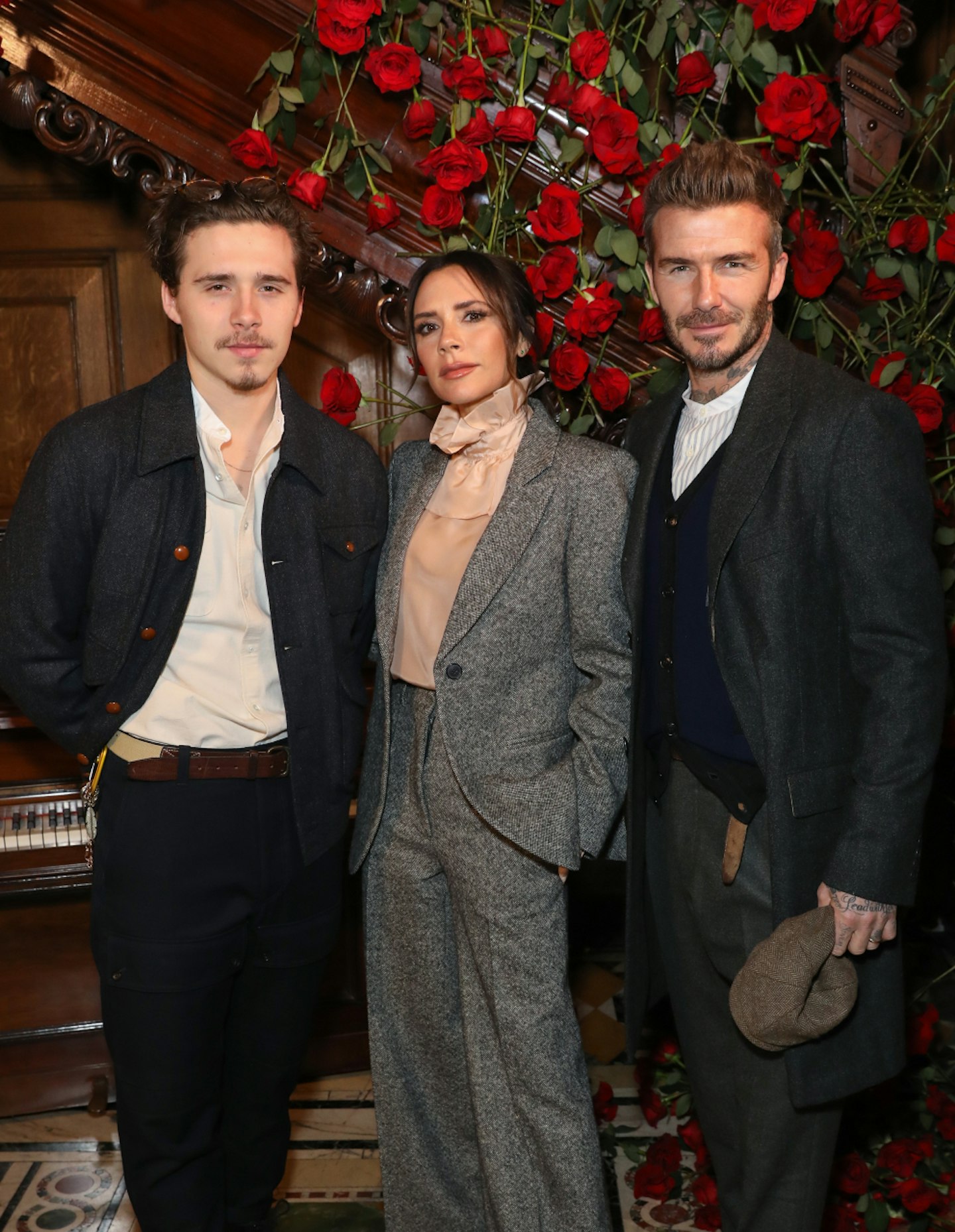 Brooklyn Beckham with parents Victoria and David