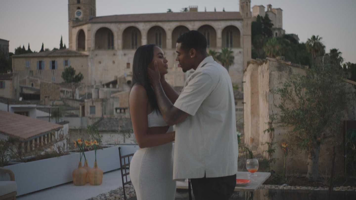 Tyrique and Ella kissing on a date