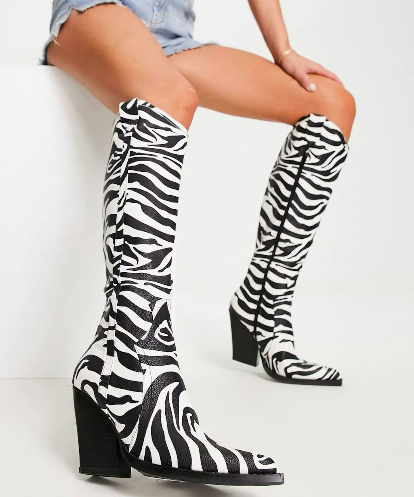 ASOS DESIGN Catapult heeled western knee boots in zebra