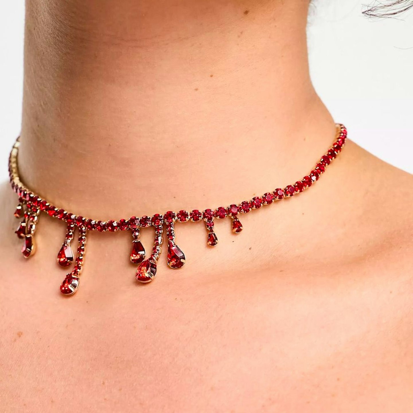 ASOS DESIGN Halloween Curve Choker Necklace In Red Crystal Design
