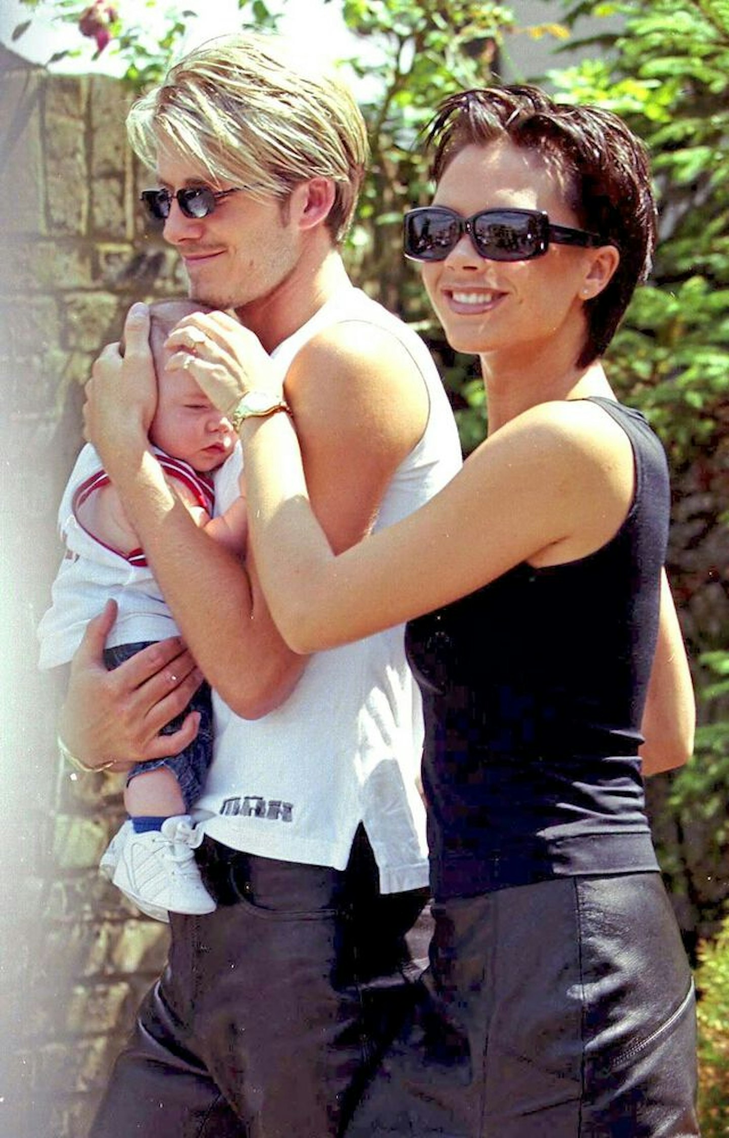 David and Victoria Beckham with baby Brooklyn