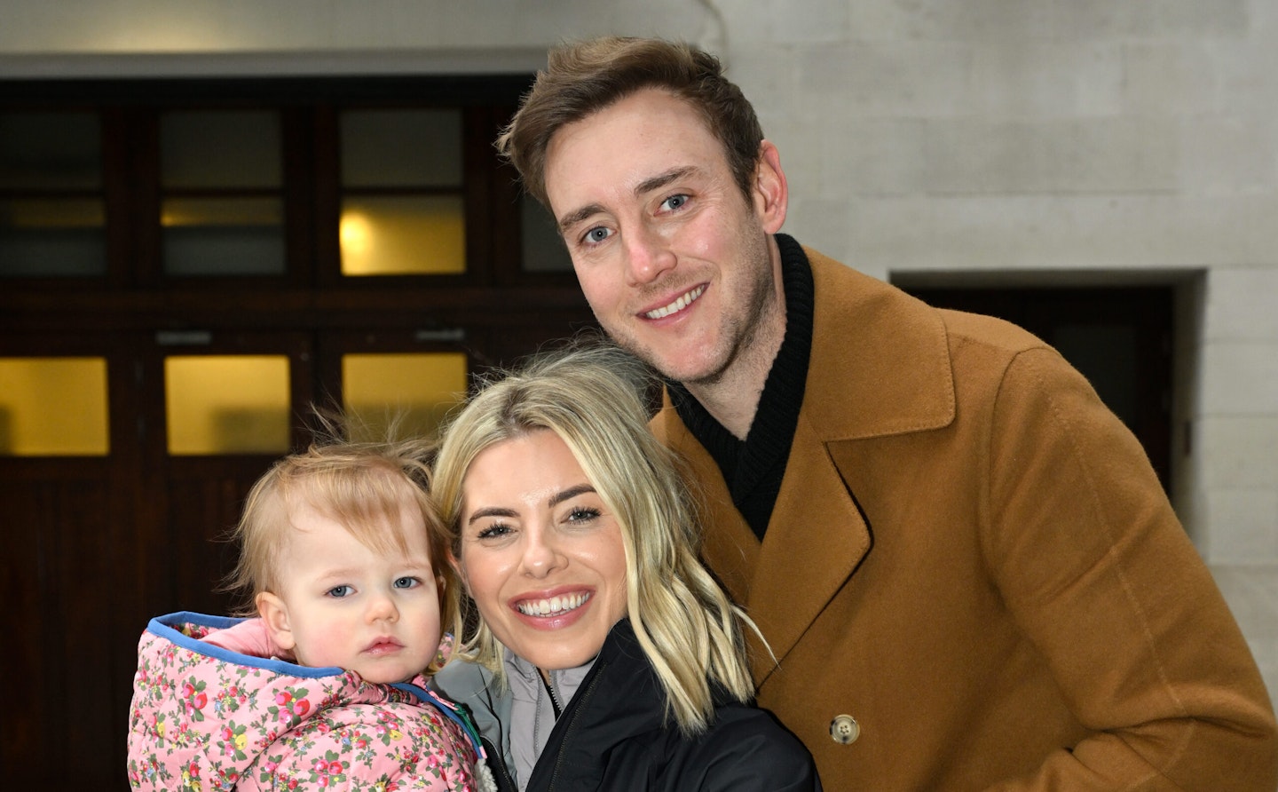 Mollie King, Stuart Broad and daughter Annabella poses for a pic before Mollie cycles from London to Hull for Comic relief at Television Centre on March 11, 2024 in London, England