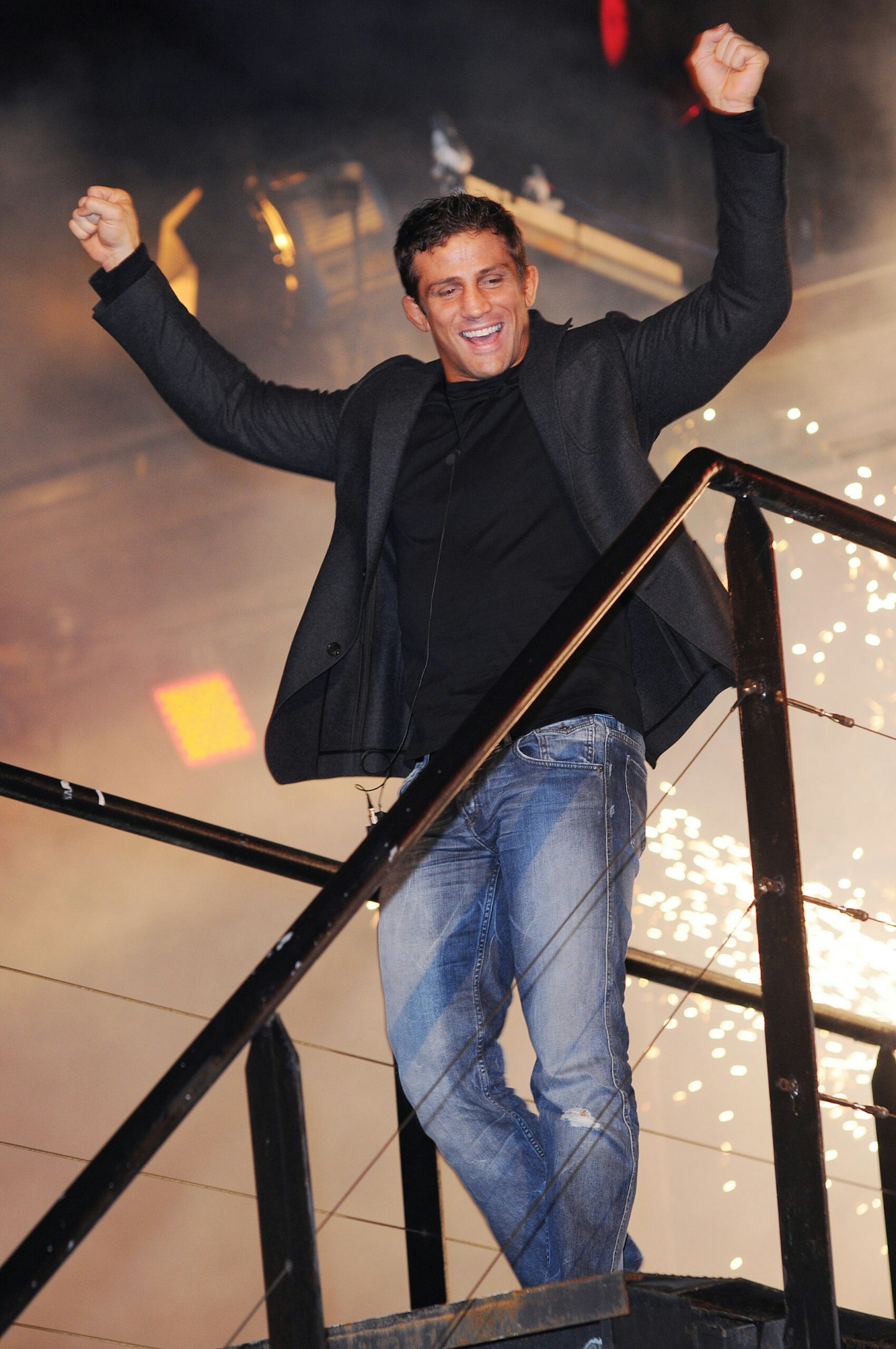 Alex Reid poses for photographs after winning Celebrity Big Brother in 2010