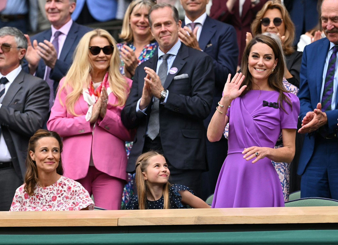 Pippa Middleton with her niece Princess Charlotte and sister Kate Middleton at Wimbledon this summer