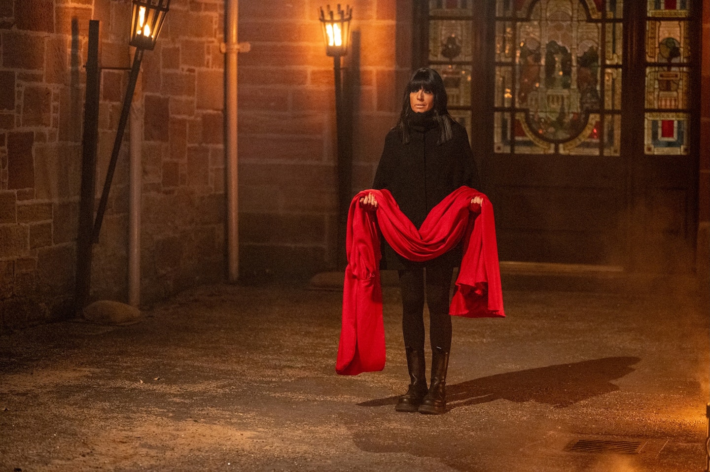 Claudia and the red Secret Traitors cloak