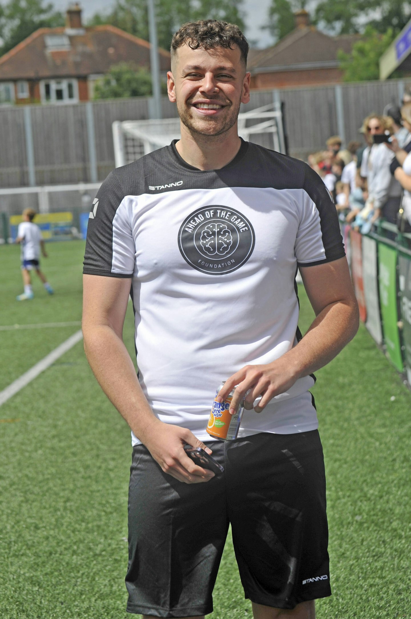 formz smiling at a Charity Football Match