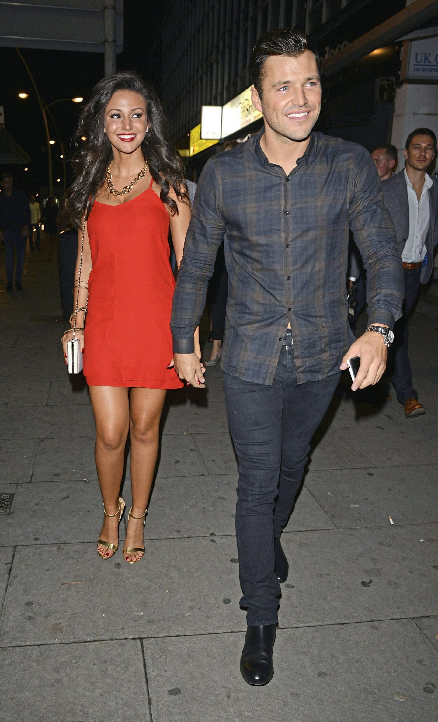 Mark Wright and Michelle Keegan walking hand in hand