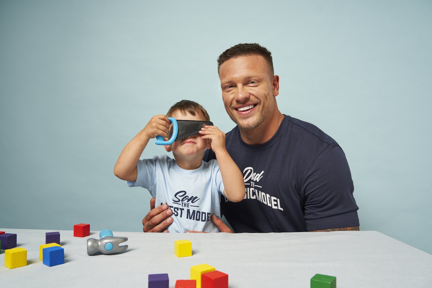 alex bowen and his son for heat magazine