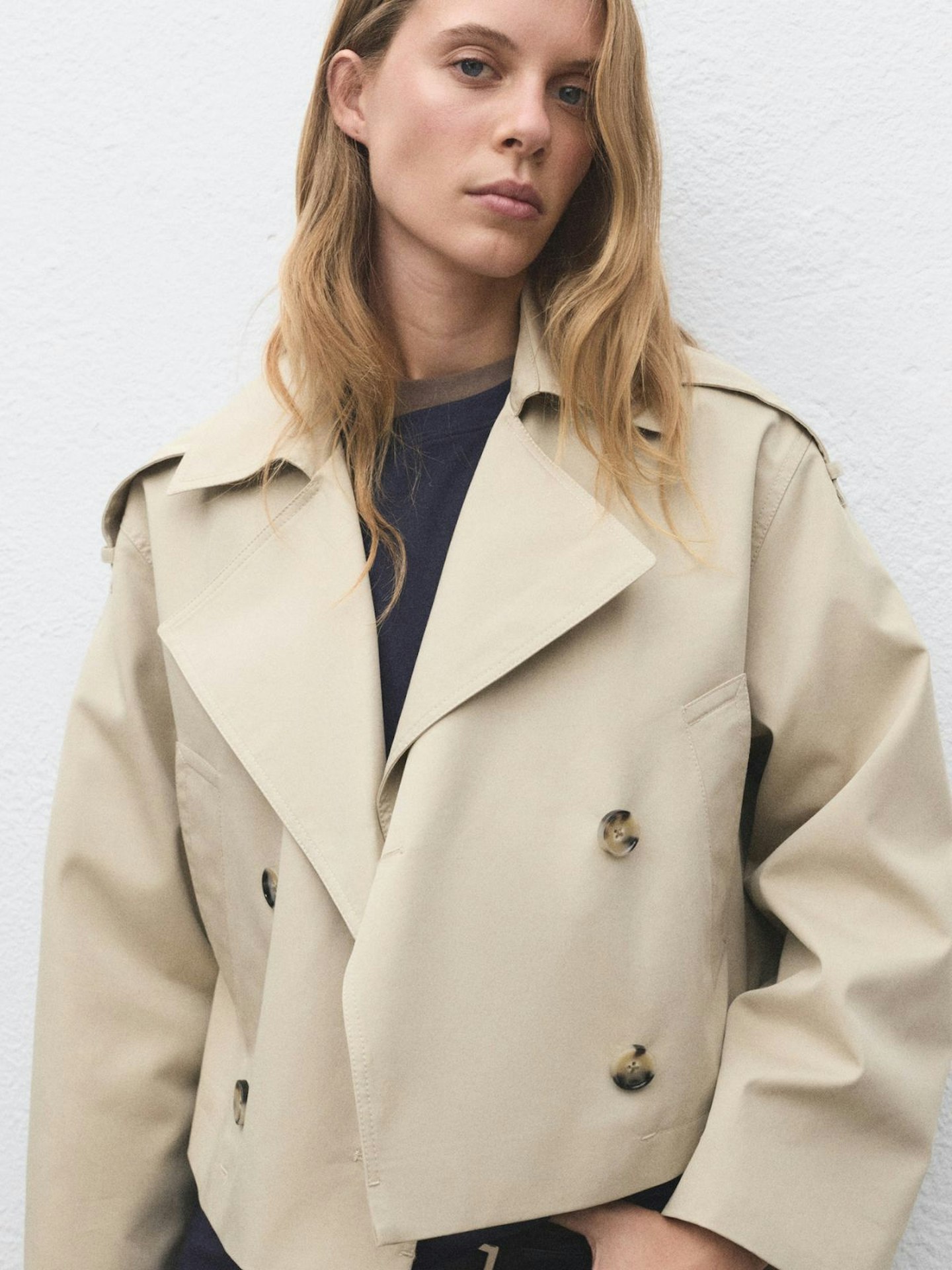 Model wearing Mango trench