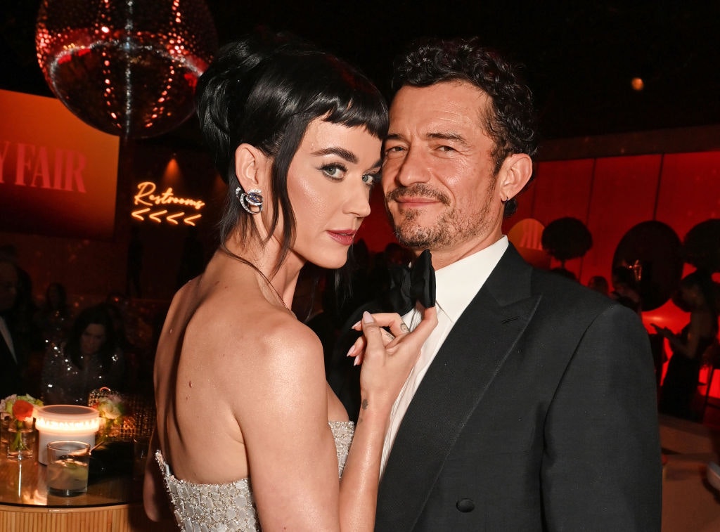 Katy Perry and Orlando Bloom attend the 2025 Vanity Fair Oscar Party Hosted By Radhika Jones at Wallis Annenberg Center for the Performing Arts
