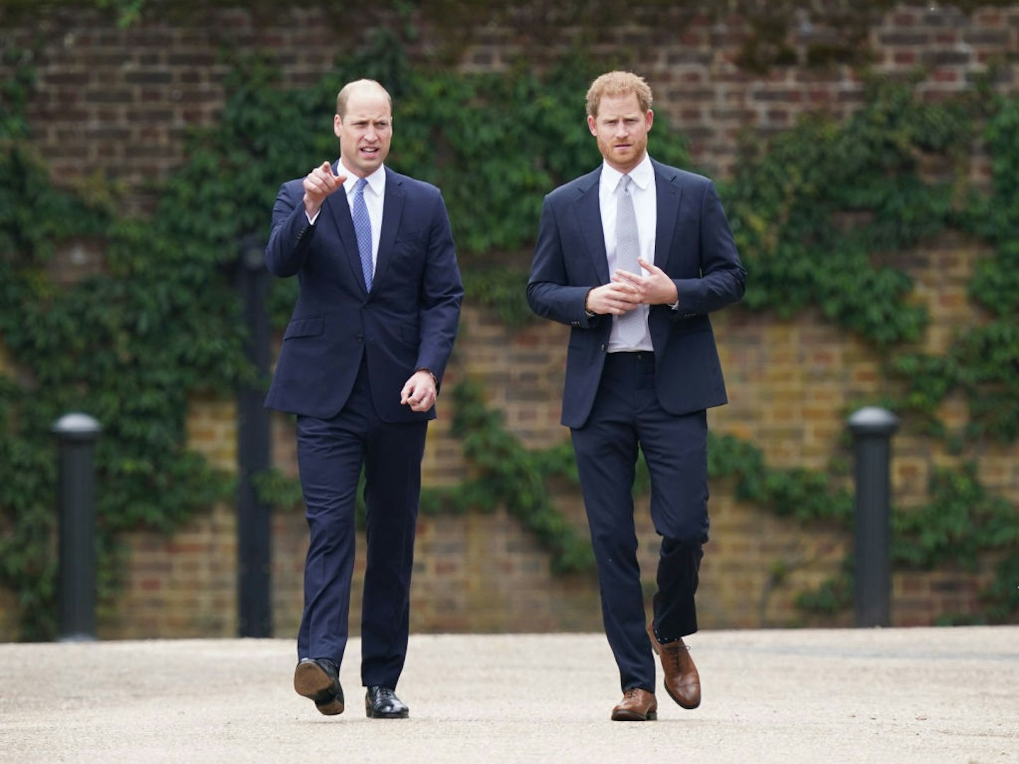 Prince William and Prince Harry arrive for the unveiling of a statue they commissioned of their mother Diana, Princess of Wales, in the Sunken Garden at Kensington Palace, on what would have been her 60th birthday